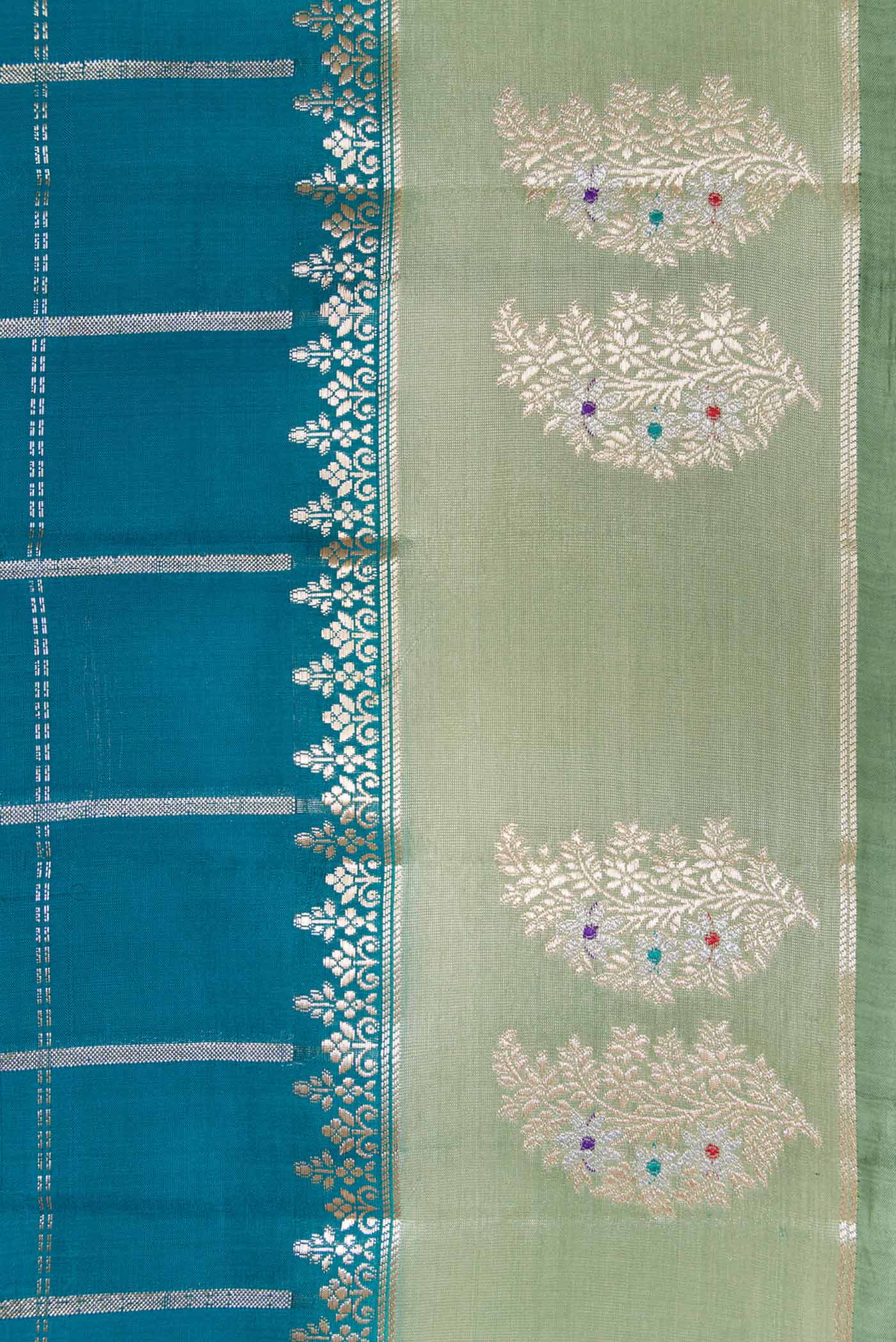 Border image of Peacock Blue Dual Tone Tussar Silk Saree with Checked design on the body and Zari Border. 