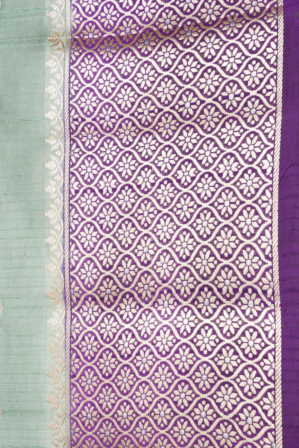 Border image of Sea Green Dual Tone Tussar Silk Saree with Zari And Thread Butta on the body and Zari Border. 