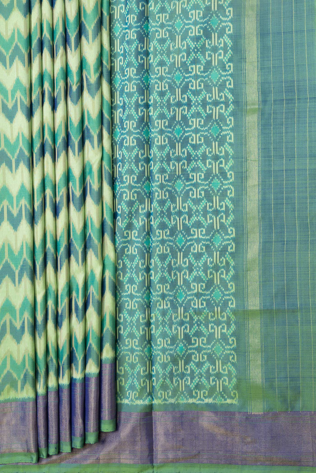 Pleats and pallu of Green Dual Tone Double Ikat Saree with Ikat Print on the body and Zari Border. 