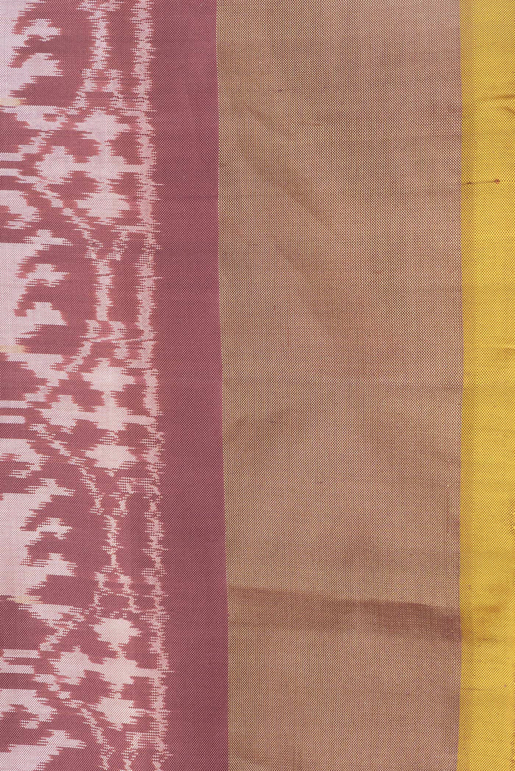 Border image of Brown Dual Tone Double Ikat Saree with Ikat Print on the body and Zari Border. 