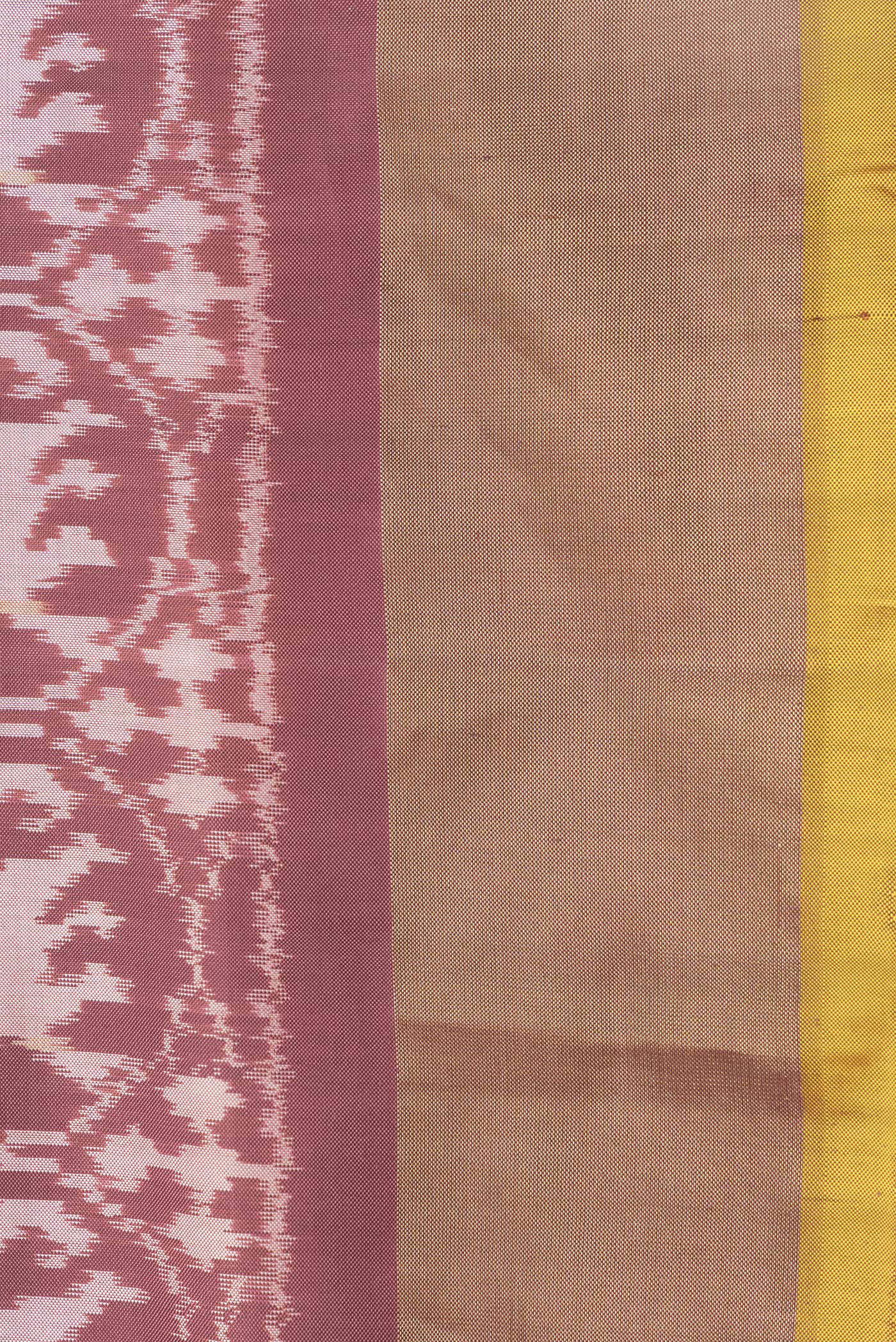Border image of Brown Dual Tone Double Ikat Saree with Ikat Print on the body and Zari Border. 