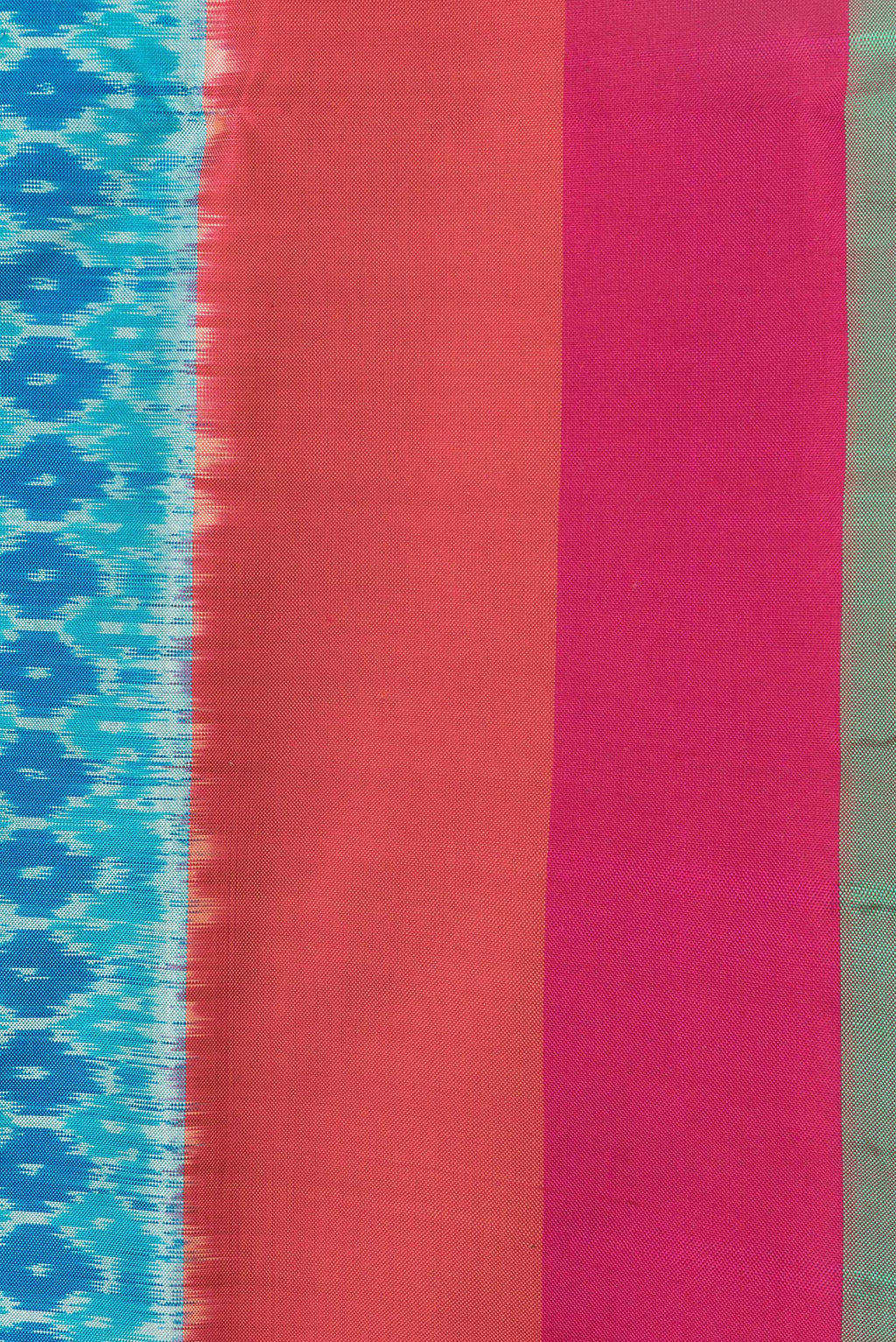 Border image of Sky Blue Dual Tone Double Ikat Saree with Ikat Print on the body and Plain Border. 