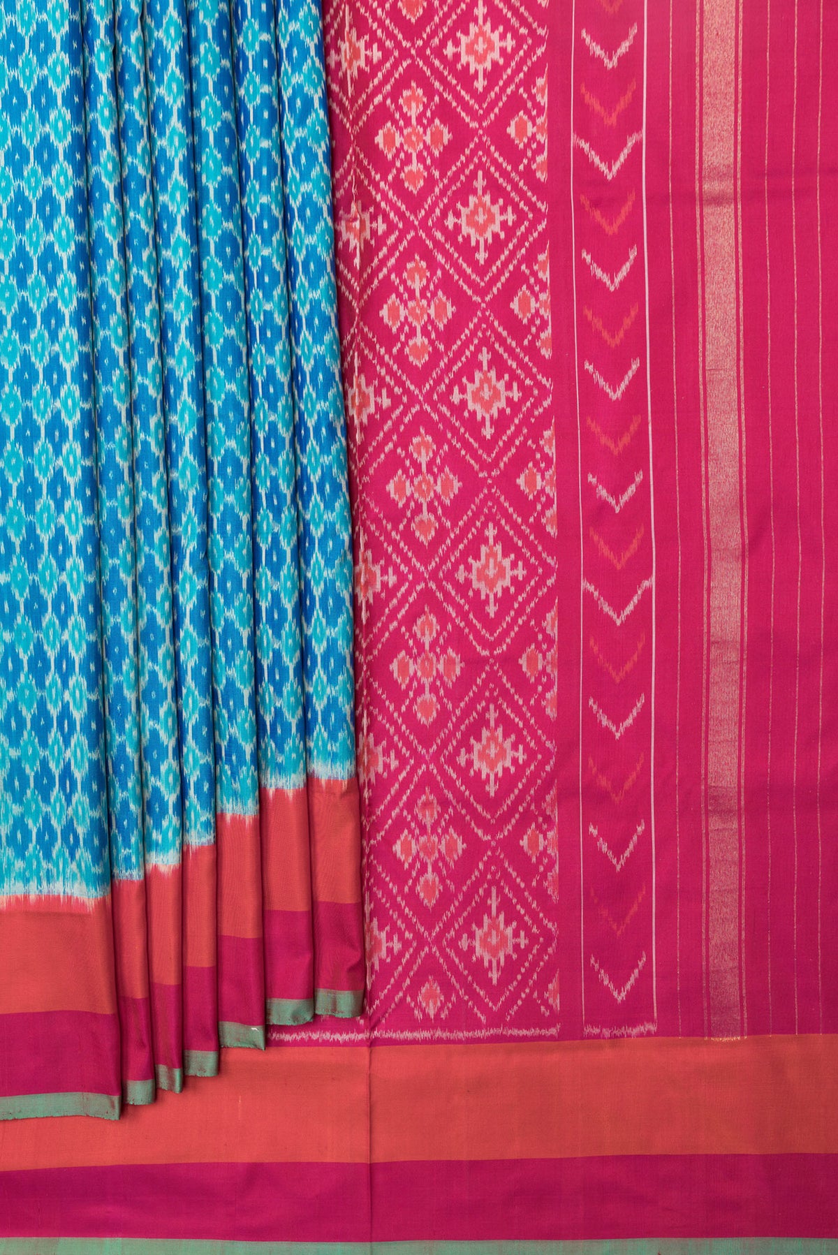 Pleats and pallu of Sky Blue Dual Tone Double Ikat Saree with Ikat Print on the body and Plain Border. 