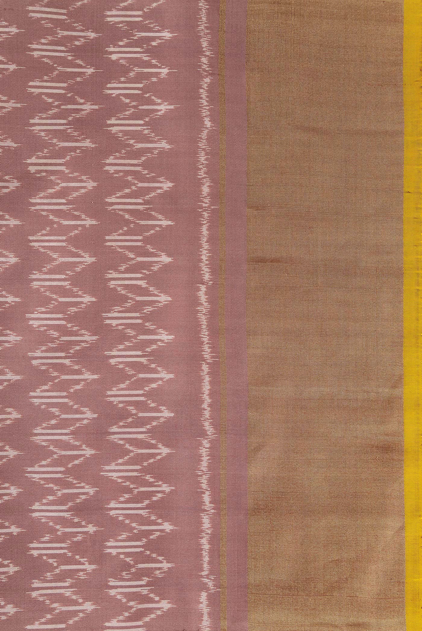 Border image of Brown Dual Tone Double Ikat Saree with Ikat Print on the body and Zari Border. 