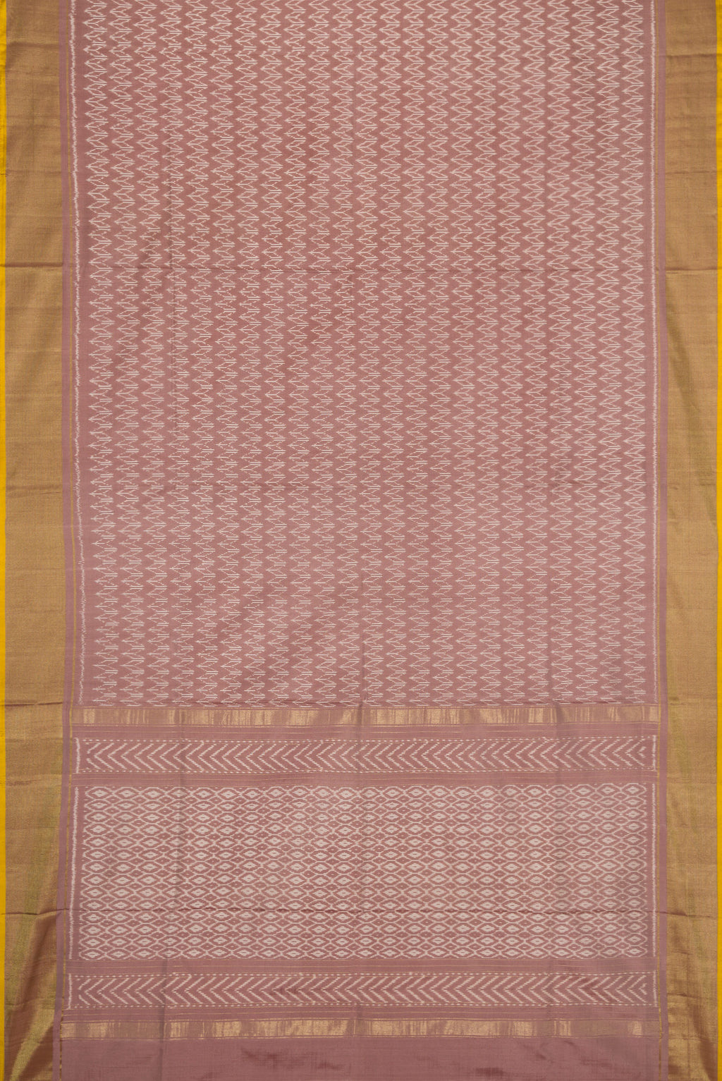 Flat view of Brown Dual Tone Double Ikat Saree with Ikat Print on the body and Zari Border. 