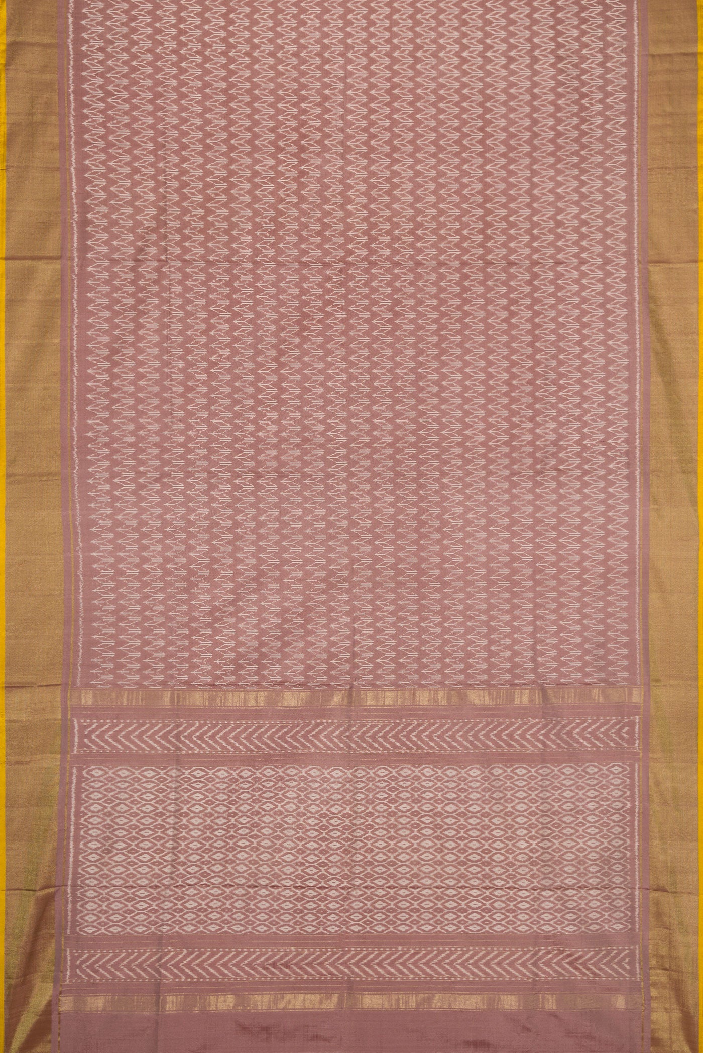 Flat view of Brown Dual Tone Double Ikat Saree with Ikat Print on the body and Zari Border. 