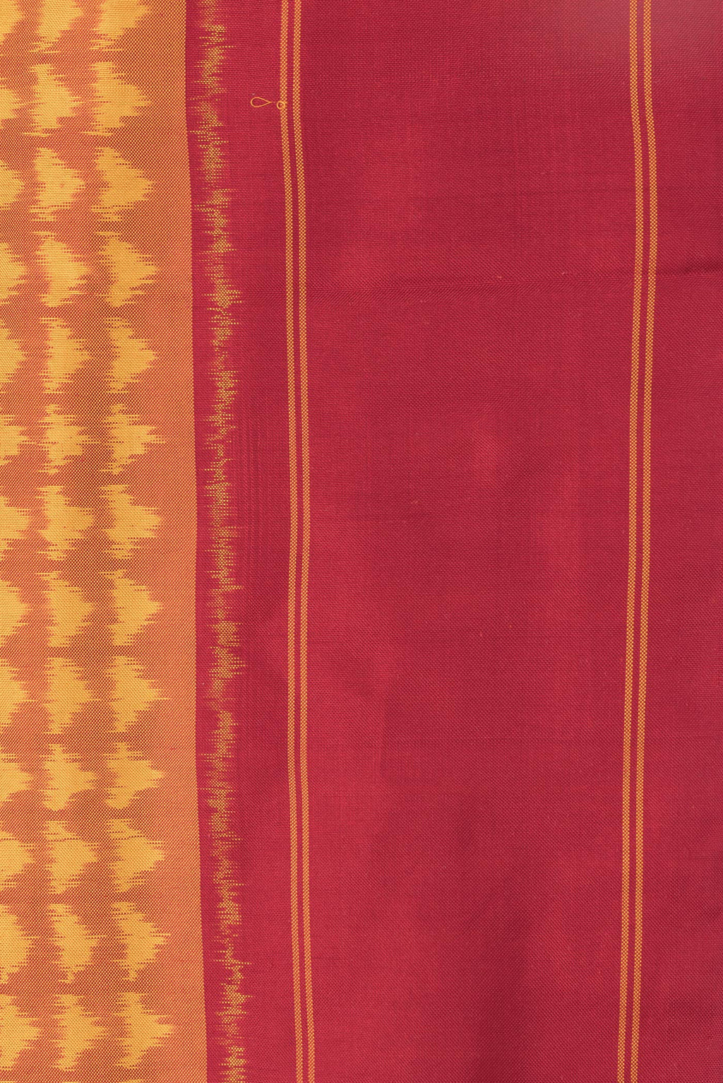 Border image of Mustard Dual Tone Double Ikat Saree with Ikat Print on the body and Plain Border. 