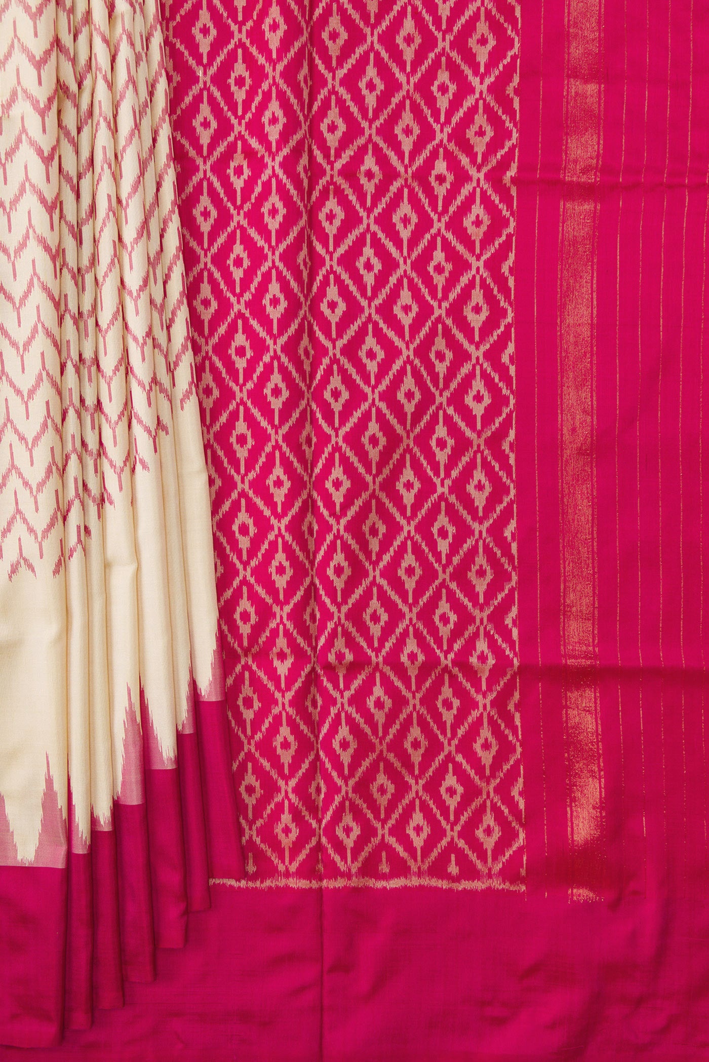 Pleats and pallu of Off White Dual Tone Double Ikat Saree with Ikat Print on the body and Temple Border. 