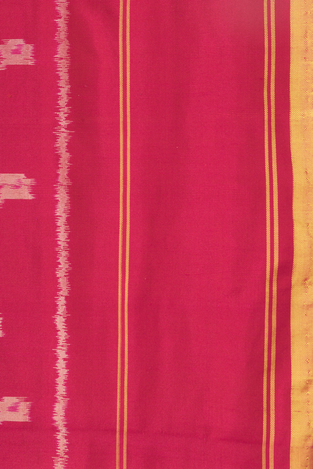 Border image of Maroon Dual Tone Double Ikat Saree with Ikat Print on the body and Plain Border. 