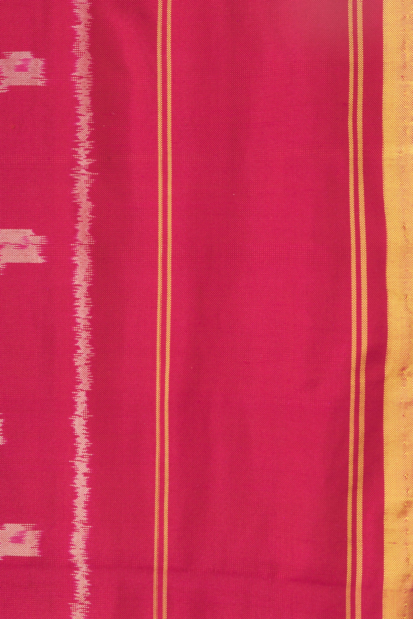 Border image of Maroon Dual Tone Double Ikat Saree with Ikat Print on the body and Plain Border. 