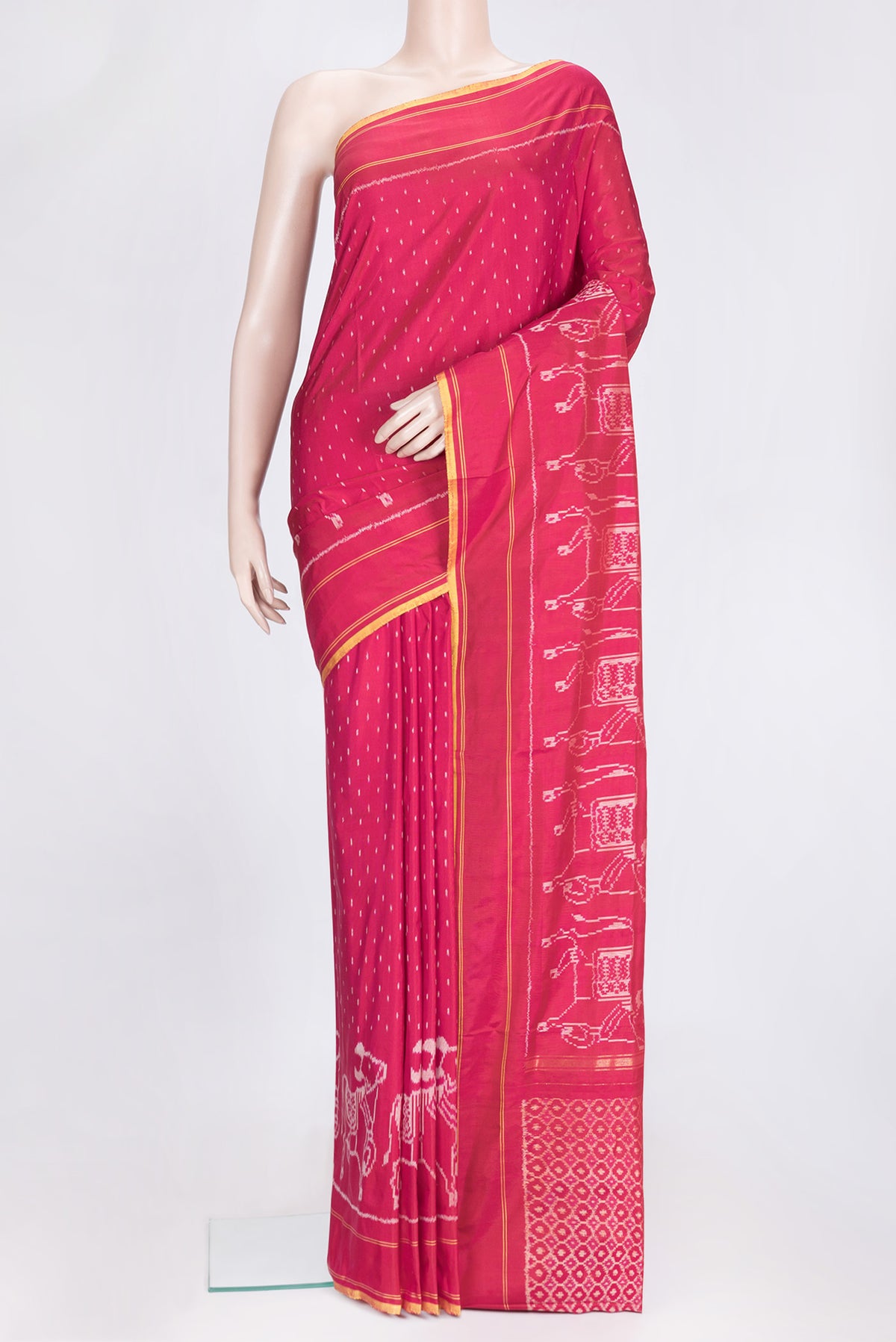 Maroon Dual Tone Double Ikat Saree with Ikat Print on the body and Plain Border.  displayed on a mannequin