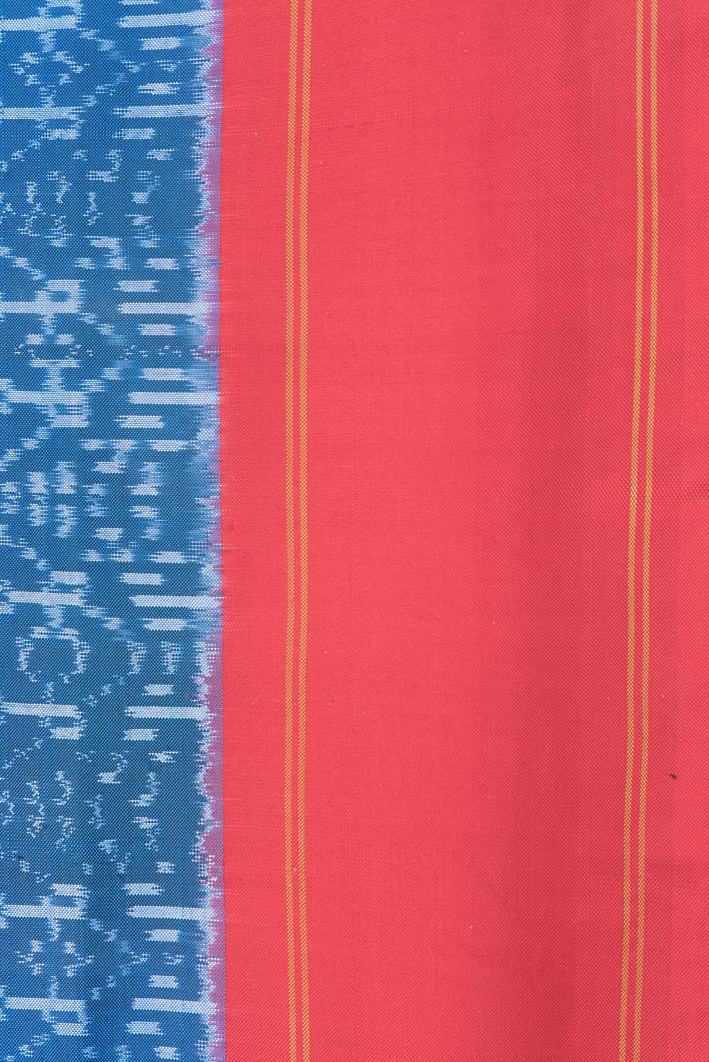 Border image of Peacock Blue Dual Tone Double Ikat Saree with Ikat Print on the body and Plain Border. 