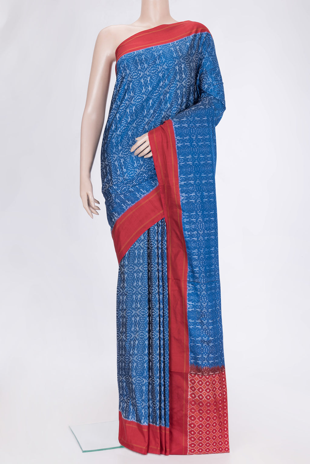 Peacock Blue Dual Tone Double Ikat Saree with Ikat Print on the body and Plain Border.  displayed on a mannequin