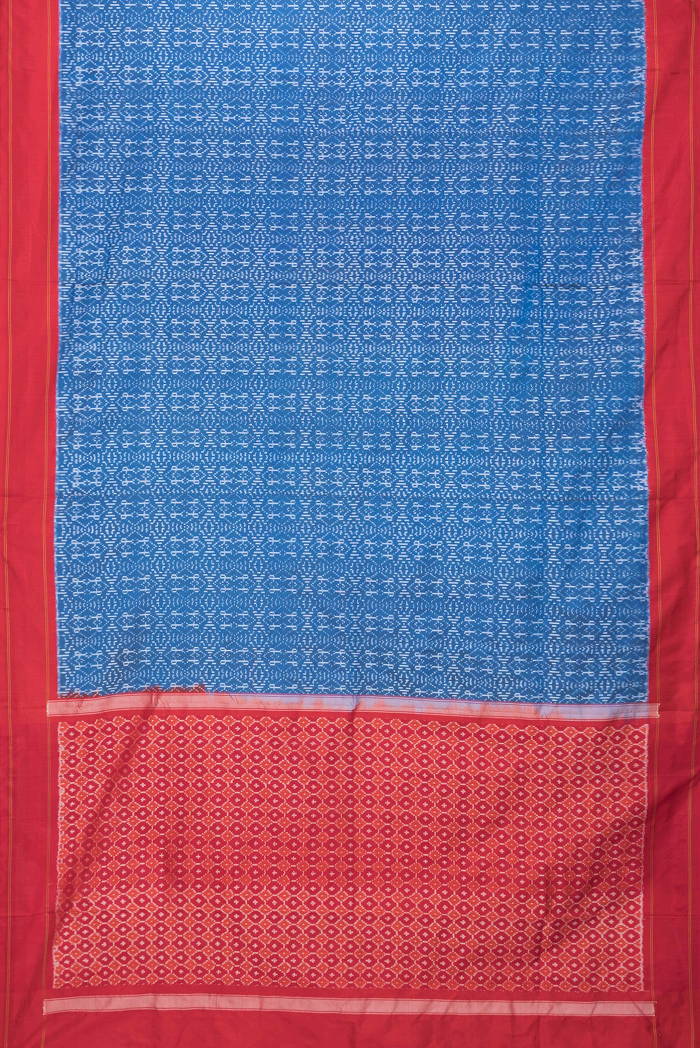 Flat view of Peacock Blue Dual Tone Double Ikat Saree with Ikat Print on the body and Plain Border. 