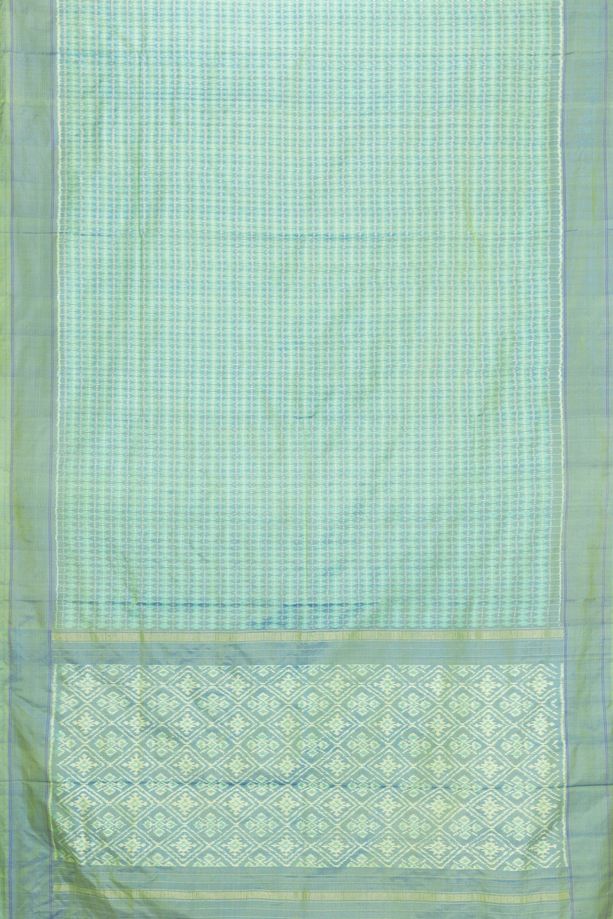Flat view of Green Dual Tone Double Ikat Saree with Ikat Print on the body and Plain Border. 
