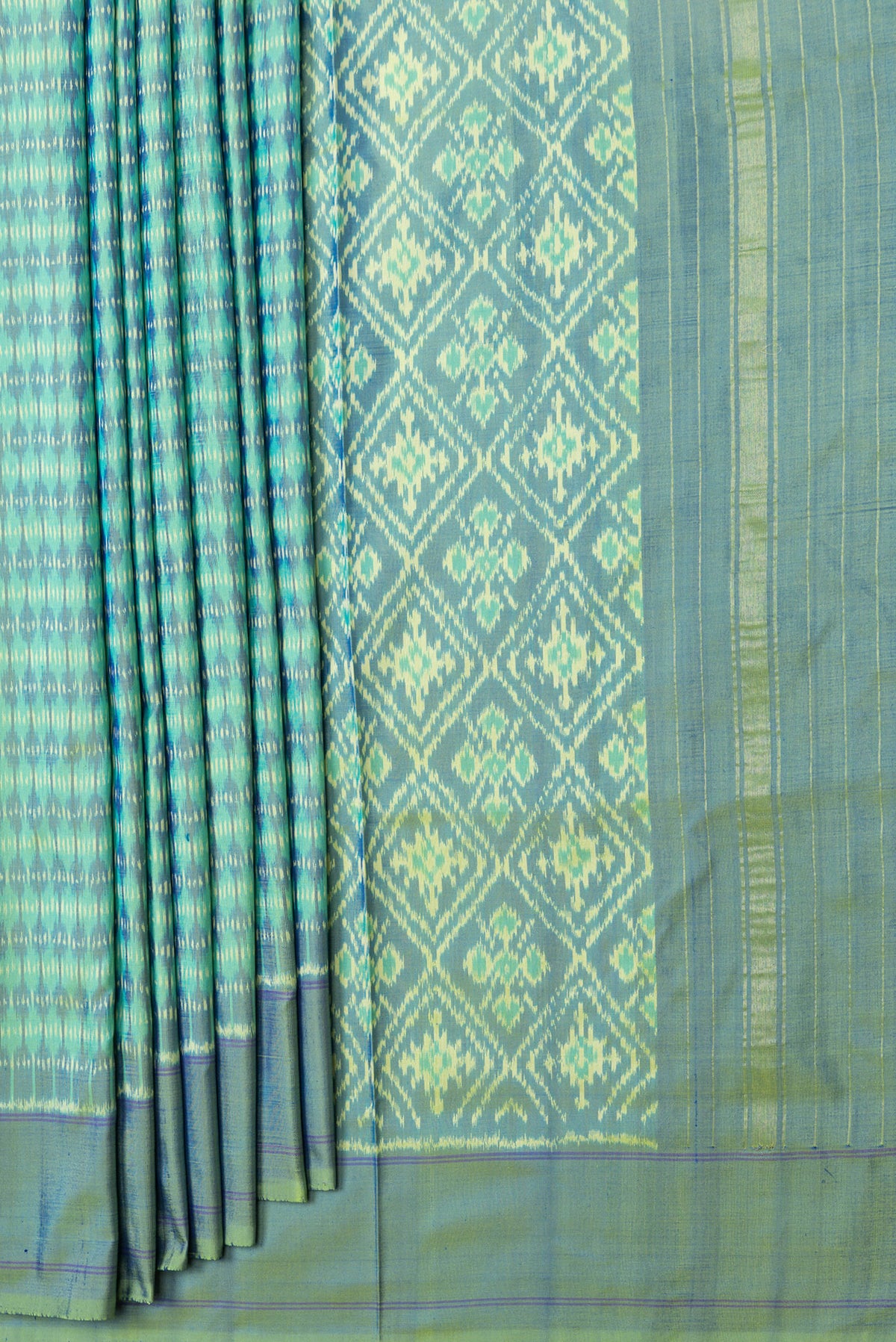 Pleats and pallu of Green Dual Tone Double Ikat Saree with Ikat Print on the body and Plain Border. 
