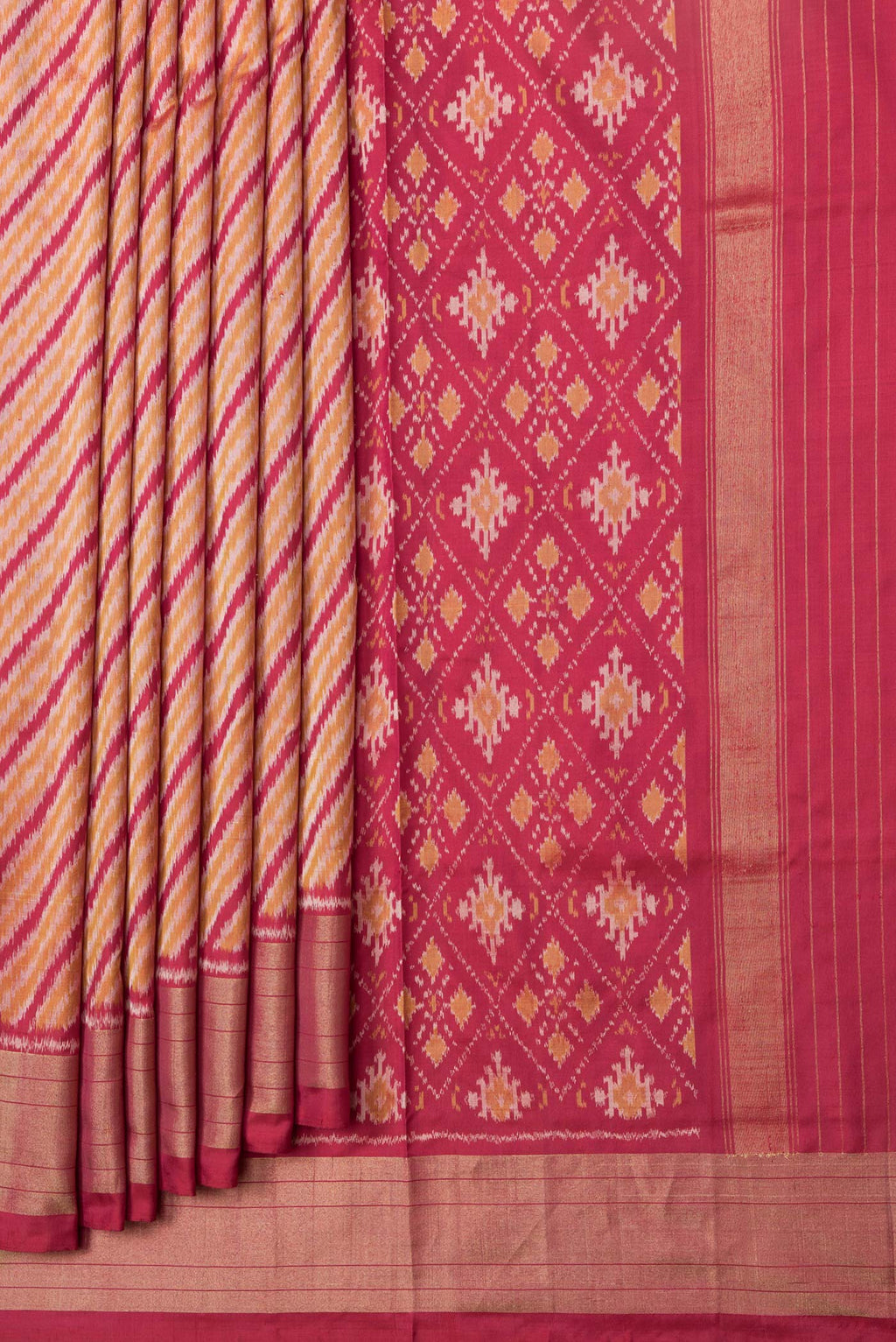 Pleats and pallu of Maroon Dual Tone Double Ikat Saree with Ikat Print on the body and Plain Border. 