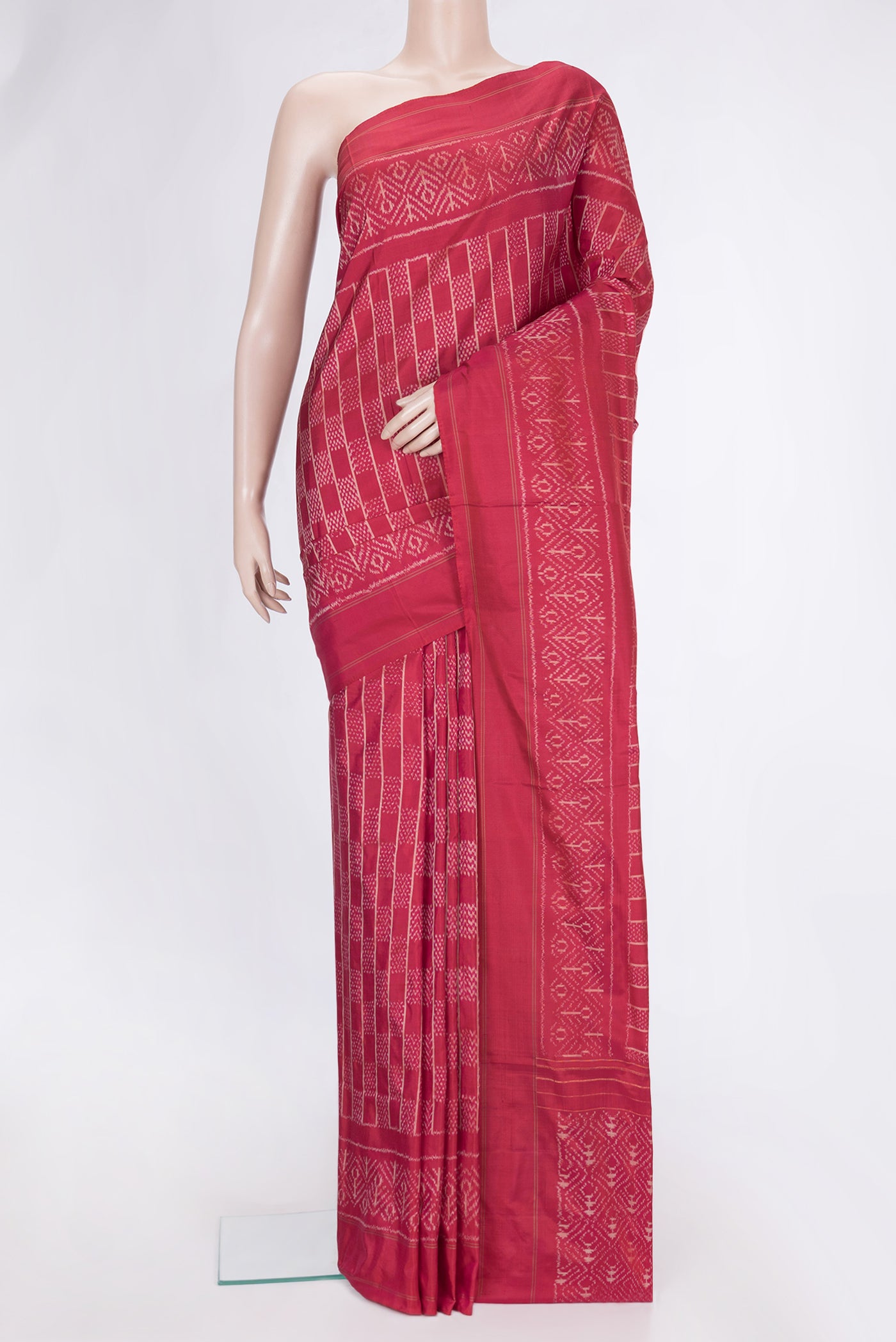 Pink Dual Tone Double Ikat Saree with Ikat Print on the body and Plain Border.  displayed on a mannequin
