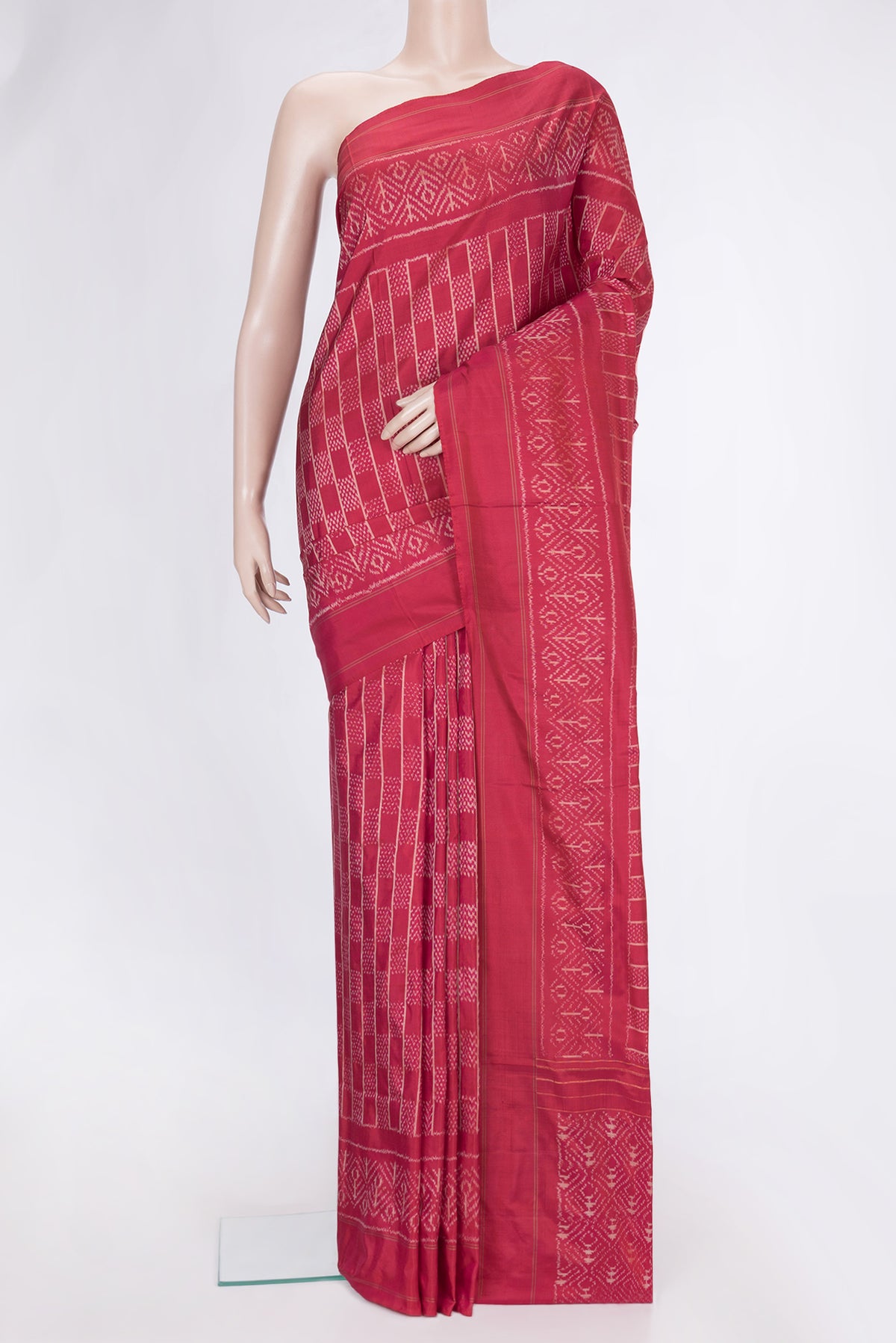 Pink Dual Tone Double Ikat Saree with Ikat Print on the body and Plain Border.  displayed on a mannequin