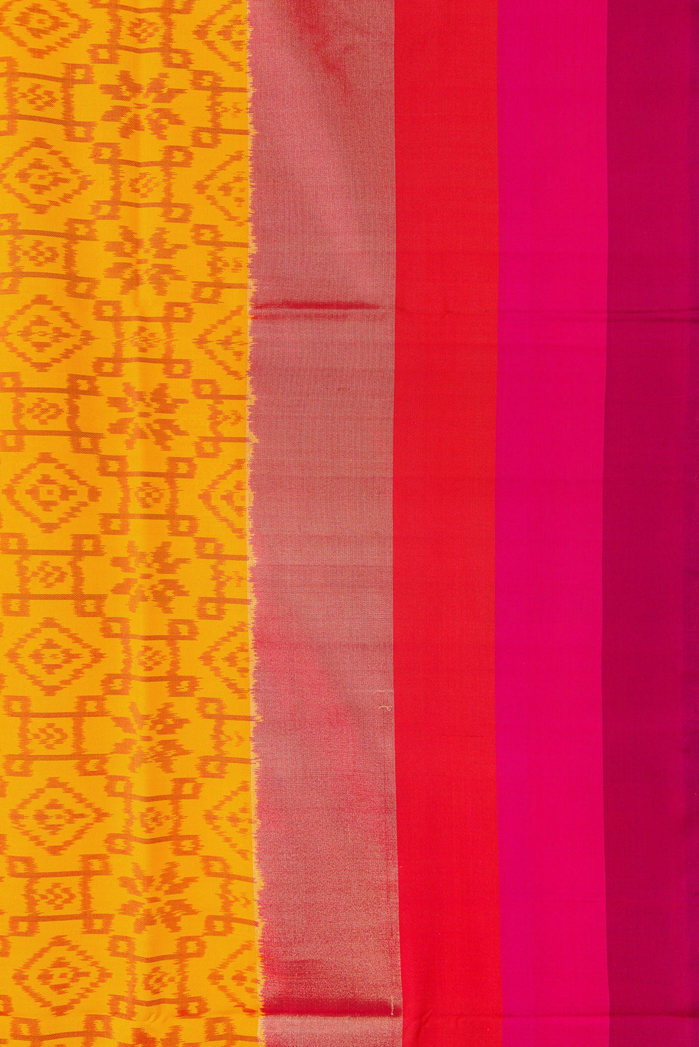 Border image of Mustard Dual Tone Double Ikat Saree with Ikat Print on the body and Zari Border. 