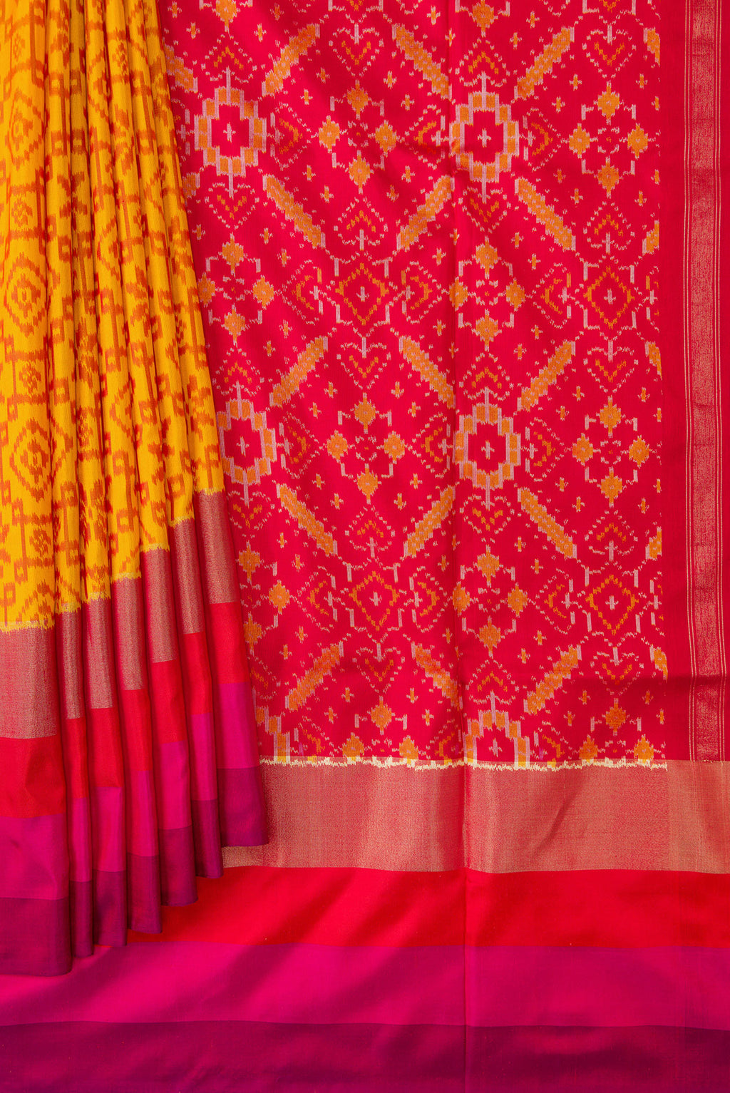 Pleats and pallu of Mustard Dual Tone Double Ikat Saree with Ikat Print on the body and Zari Border. 