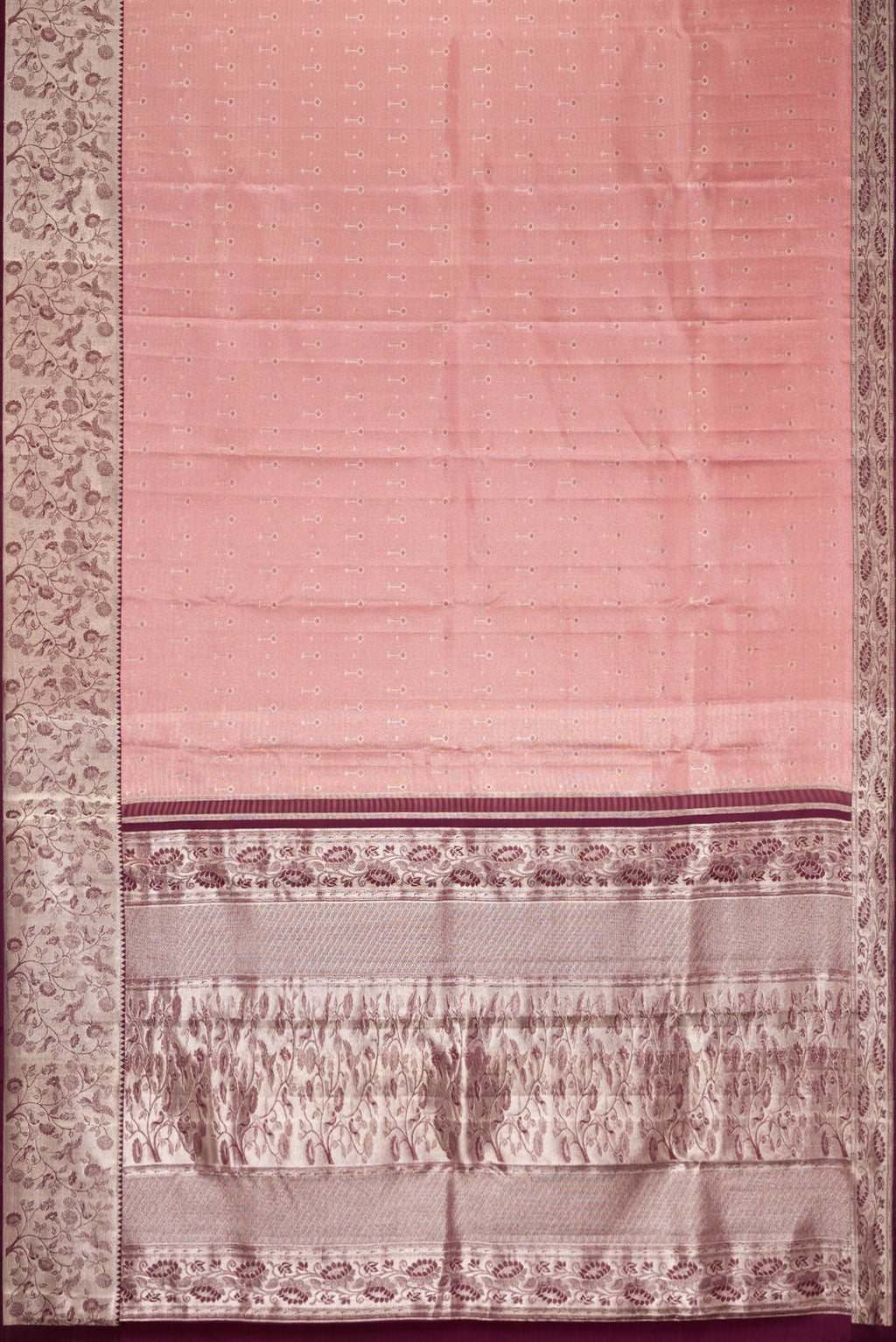 Flat view of Pink Dual Tone Kanjivaram Tissue Silk Saree with Zari Brocade on the body and Zari Border. 