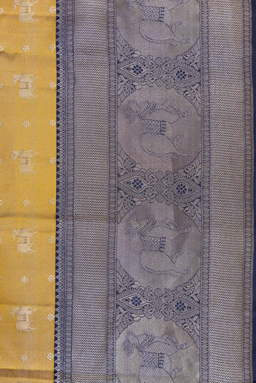 Border image of Gold Dual Tone Kanjivaram Tissue Silk Saree with Zari Brocade on the body and Fancy Border. 