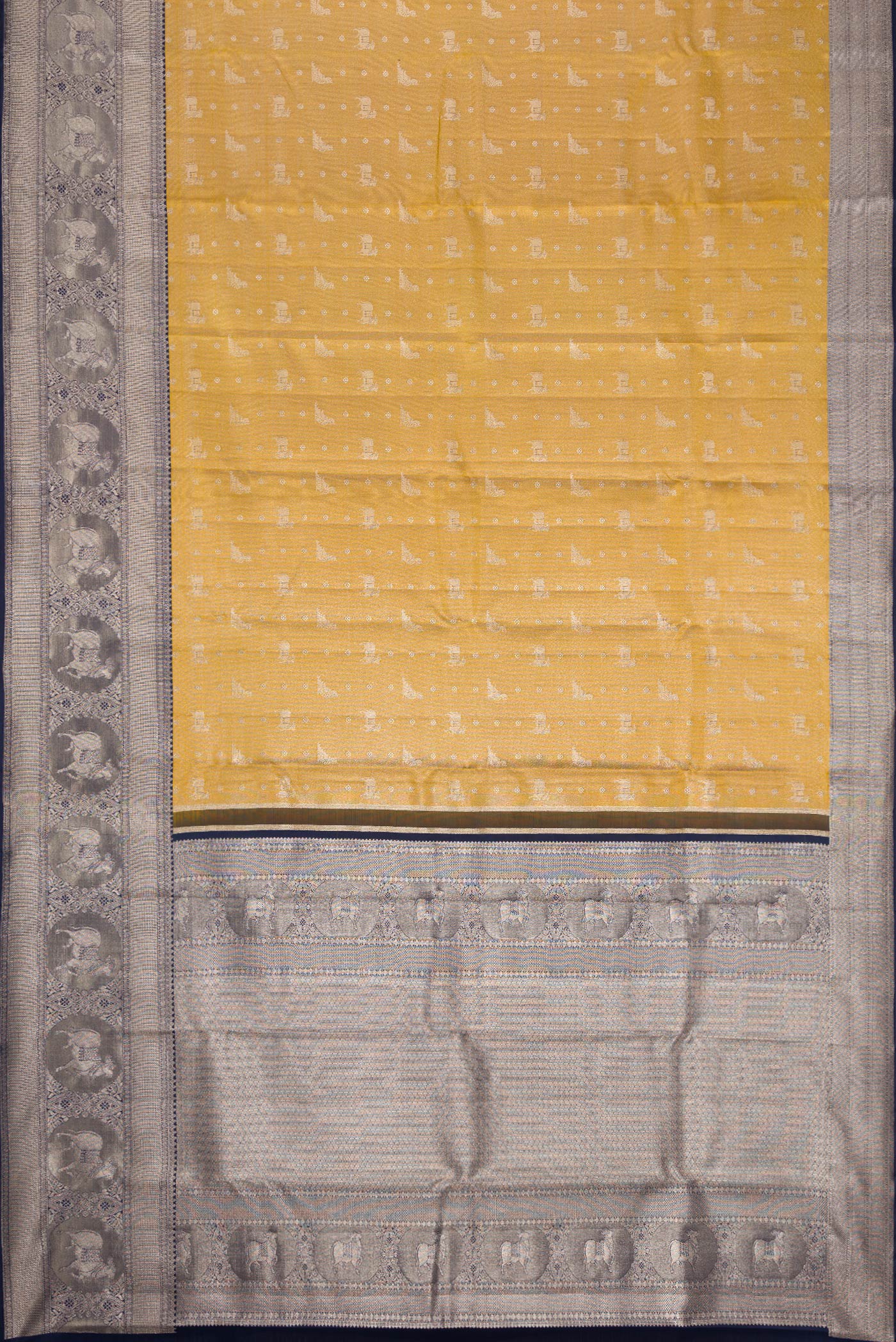Flat view of Gold Dual Tone Kanjivaram Tissue Silk Saree with Zari Brocade on the body and Fancy Border. 