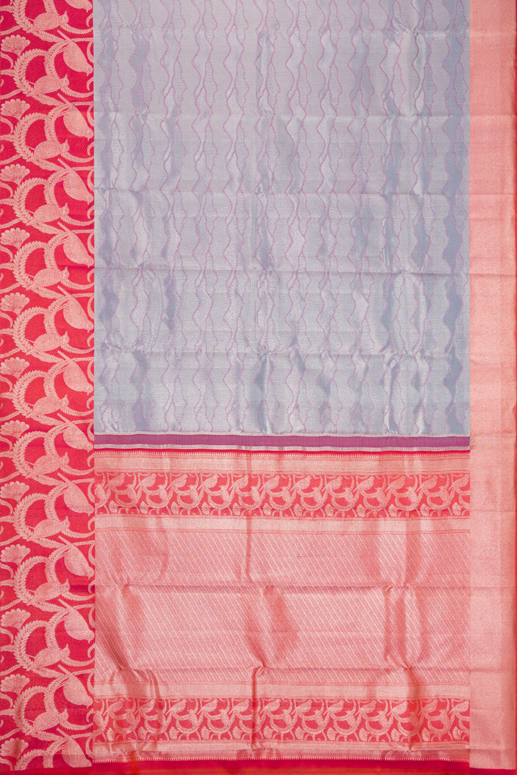 Flat view of Grey Dual Tone Kanjivaram Tissue Silk Saree with Zari Brocade on the body and Fancy Border. 