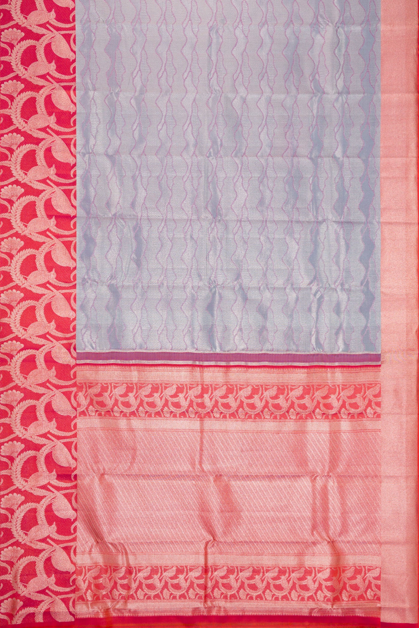 Flat view of Grey Dual Tone Kanjivaram Tissue Silk Saree with Zari Brocade on the body and Fancy Border. 