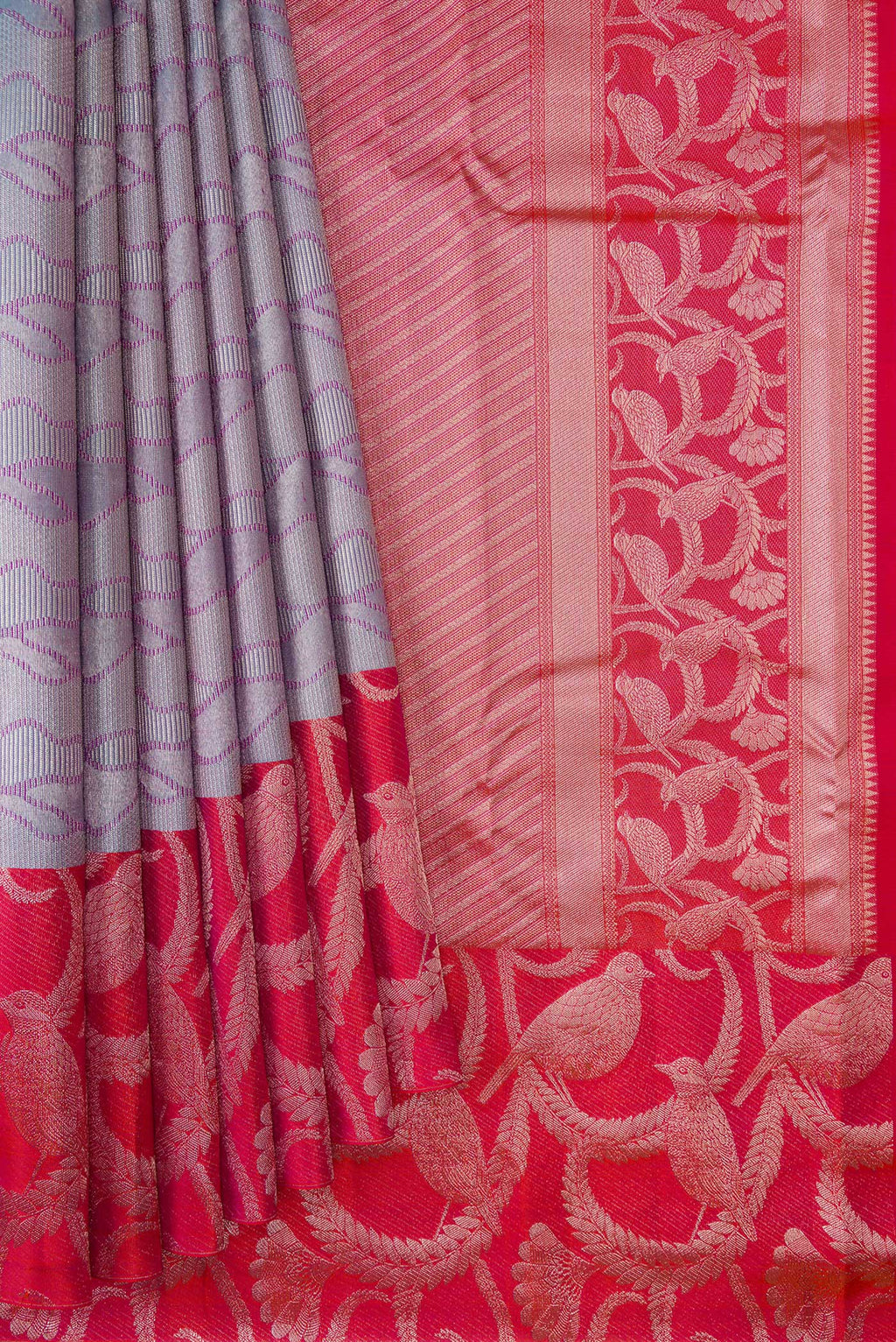 Pleats and pallu of Grey Dual Tone Kanjivaram Tissue Silk Saree with Zari Brocade on the body and Fancy Border. 