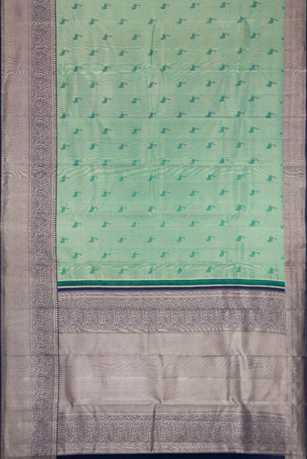 Flat view of Green Dual Tone Kanjivaram Tissue Silk Saree with Zari Brocade on the body and Fancy Border. 