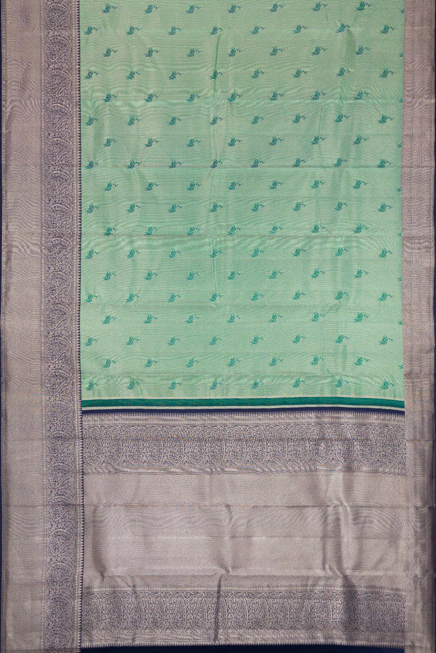 Flat view of Green Dual Tone Kanjivaram Tissue Silk Saree with Zari Brocade on the body and Fancy Border. 