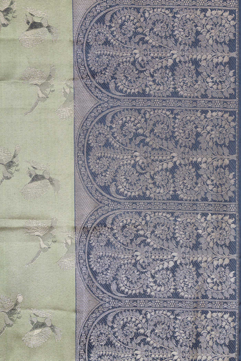 Border image of Sea Green Dual Tone Kanjivaram Tissue Silk Saree with Zari Brocade on the body and Fancy Border. 