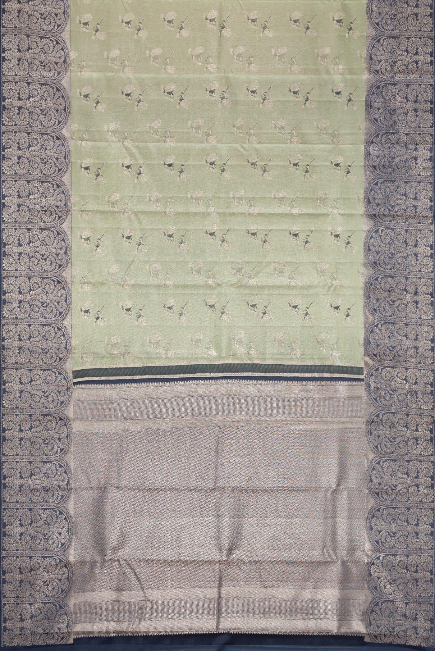 Flat view of Sea Green Dual Tone Kanjivaram Tissue Silk Saree with Zari Brocade on the body and Fancy Border. 