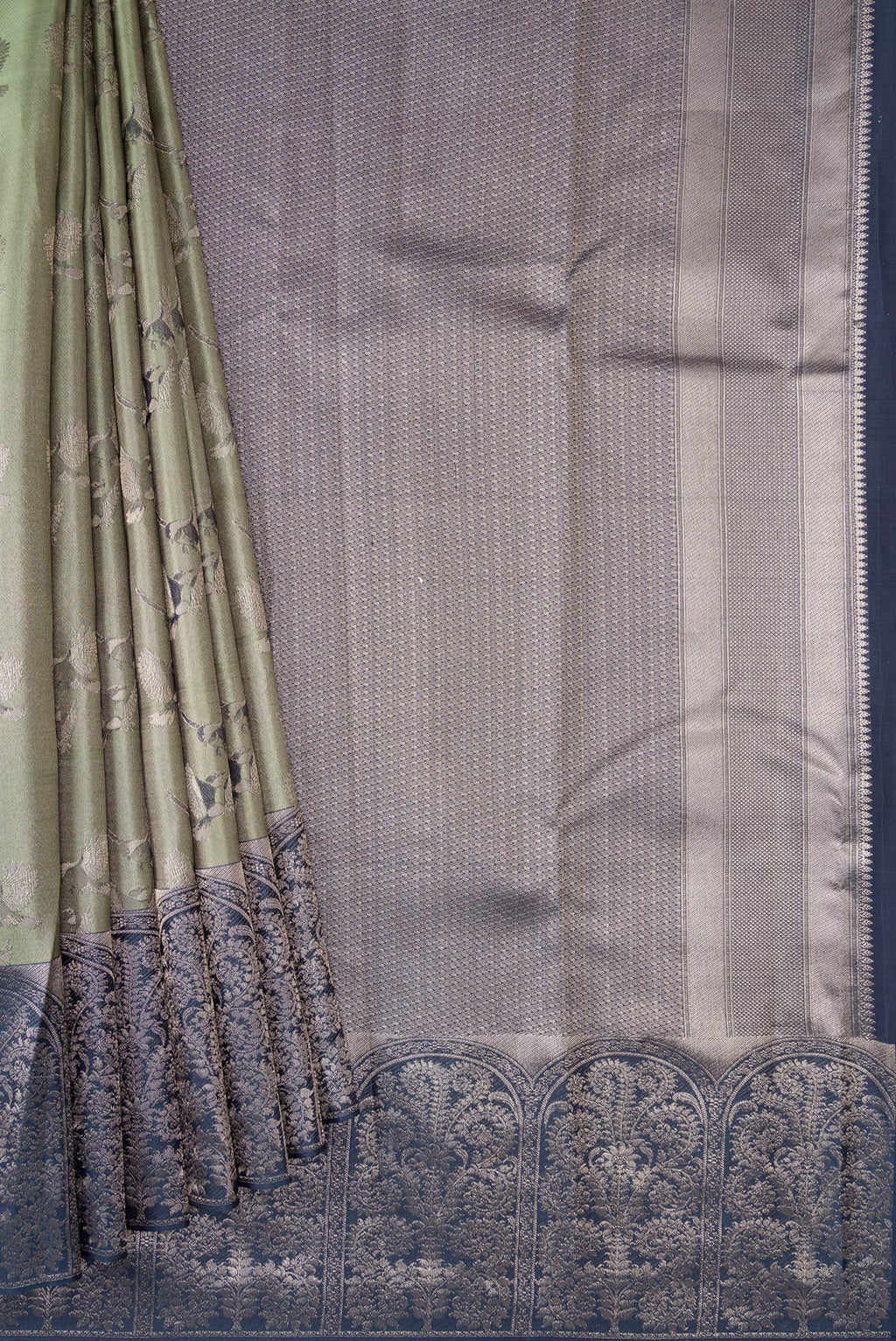 Pleats and pallu of Sea Green Dual Tone Kanjivaram Tissue Silk Saree with Zari Brocade on the body and Fancy Border. 