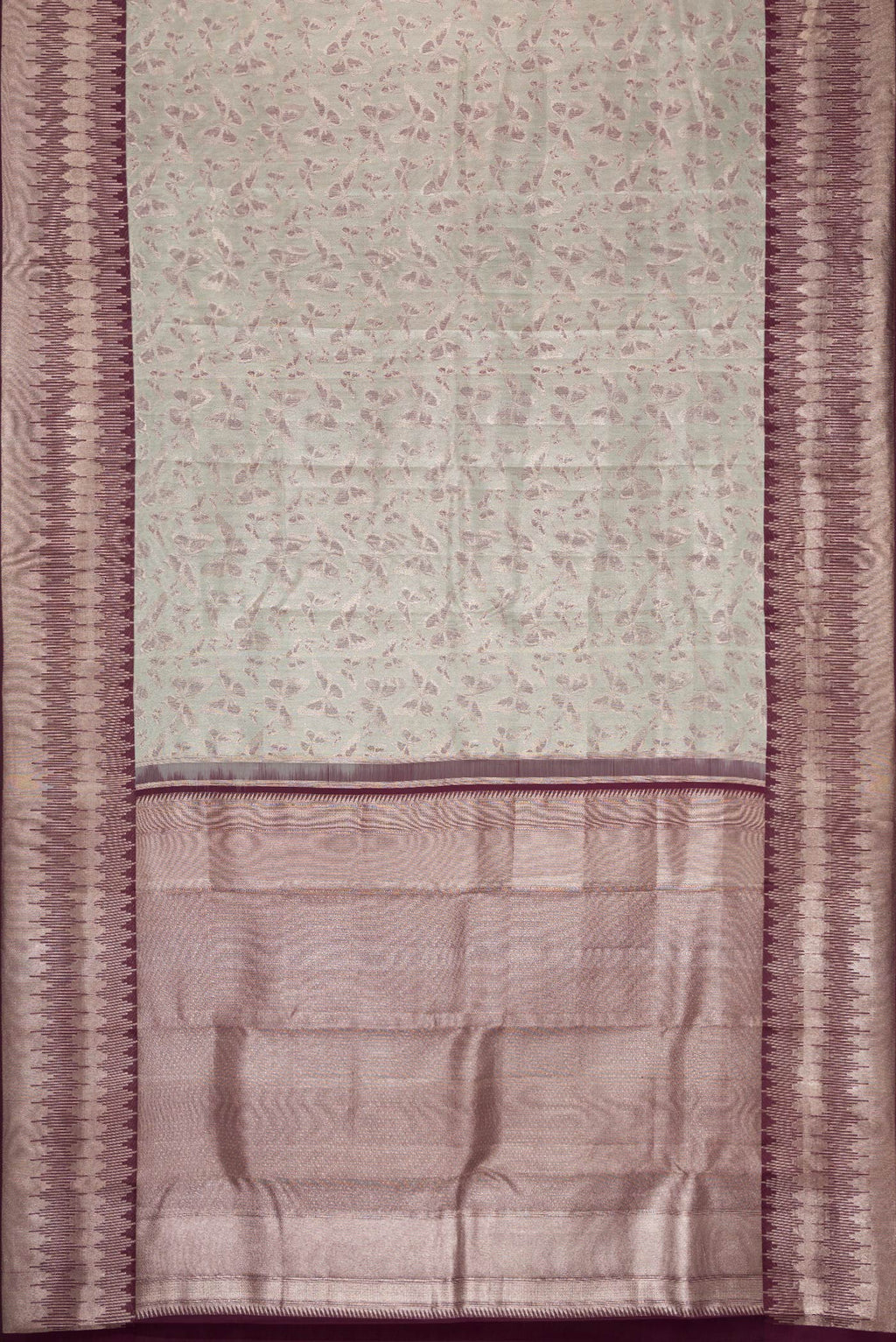 Flat view of Light Green Dual Tone Kanjivaram Tissue Silk Saree with Zari Brocade on the body and Fancy Border. 