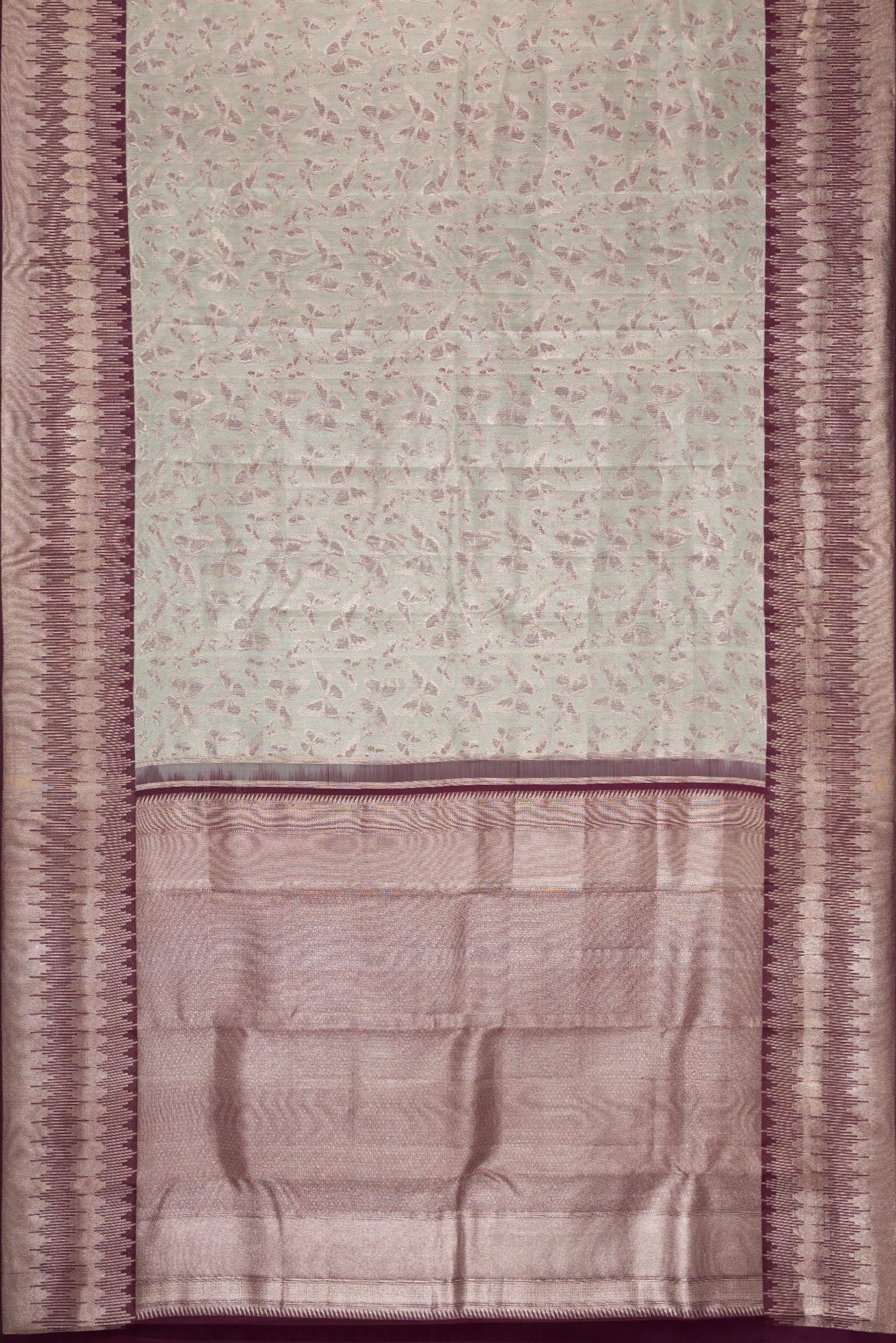 Flat view of Light Green Dual Tone Kanjivaram Tissue Silk Saree with Zari Brocade on the body and Fancy Border. 