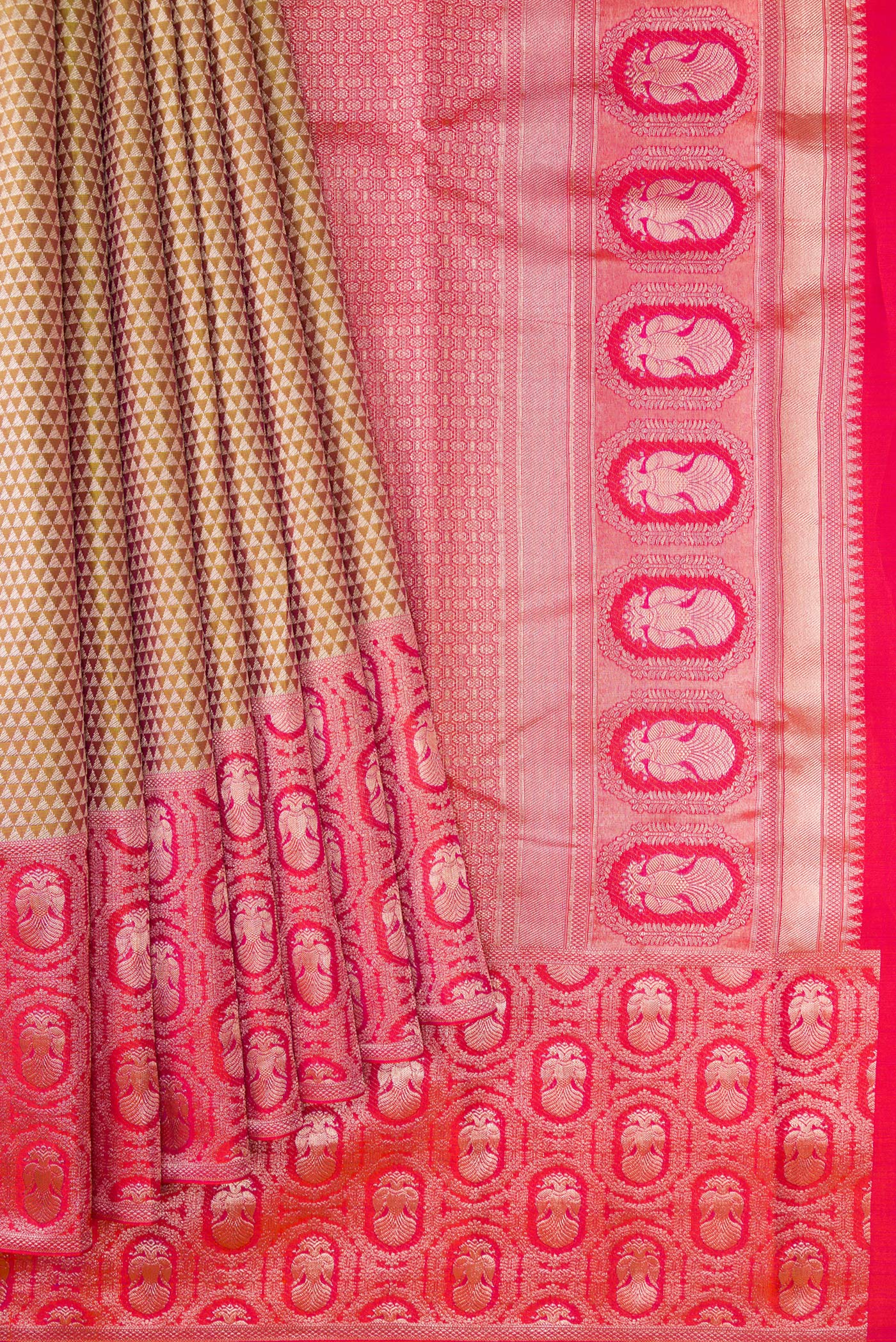 Pleats and pallu of Gold Dual Tone Kanjivaram Tissue Silk Saree with Zari Brocade on the body and Fancy Border. 