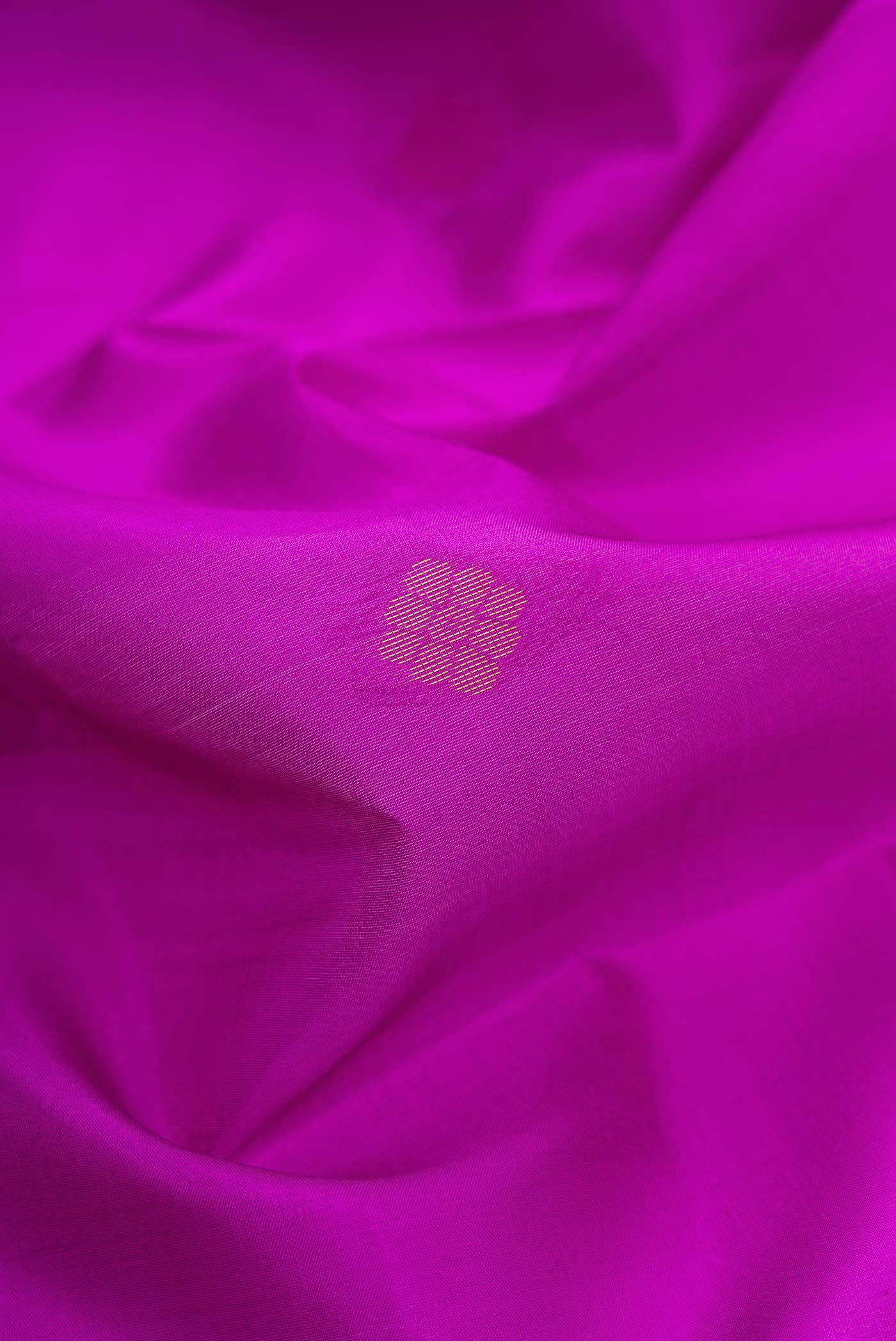Close up of Purple Dual Tone Soft Silk Saree with Zari Butta on the body and Fancy Border.  displaying folds