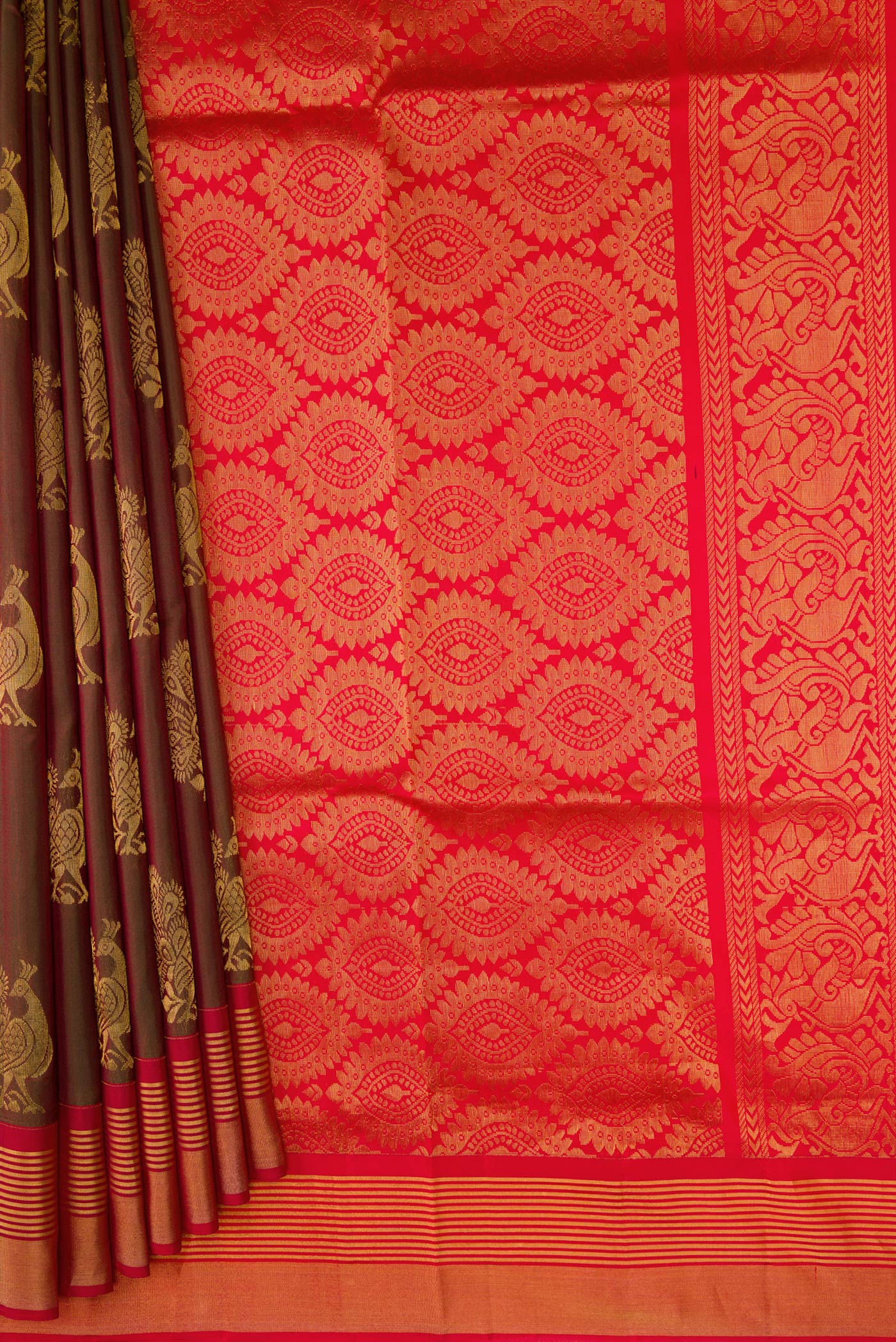 Pleats and pallu of Bottle Green Dual Tone Soft Silk Saree with Zari Butta on the body and Zari Border. 