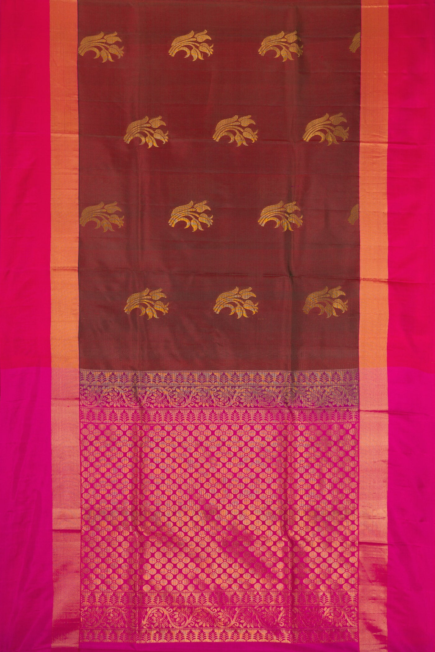 Maroon Dual Tone Soft Silk Saree with Zari Butta on the body and Fancy Border.  displayed on a mannequin