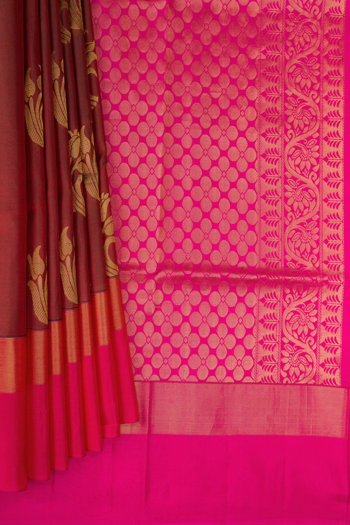 Pleats and pallu of Maroon Dual Tone Soft Silk Saree with Zari Butta on the body and Fancy Border. 