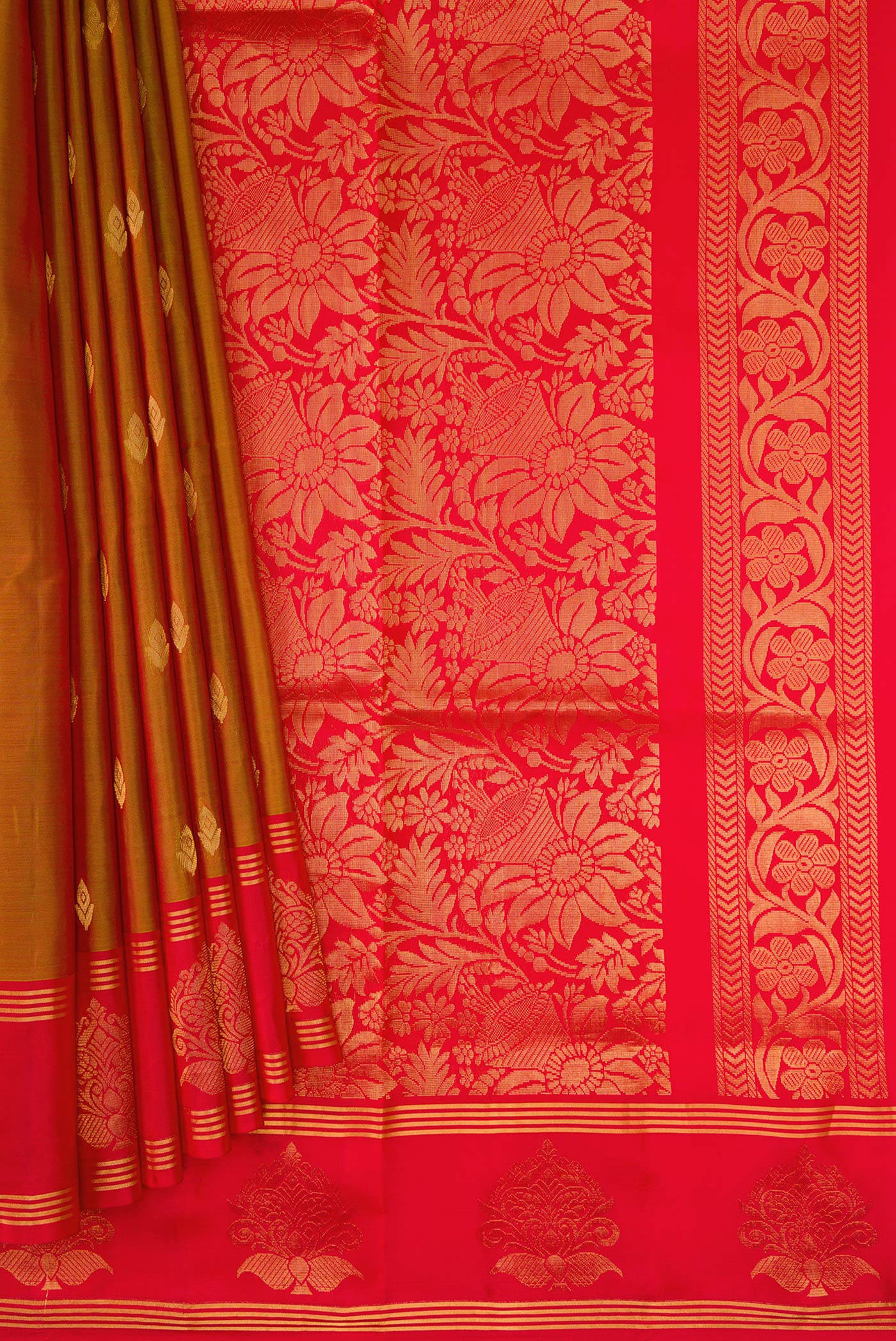 Pleats and pallu of Mustard Dual Tone Soft Silk Saree with Zari Butta on the body and Fancy Border. 
