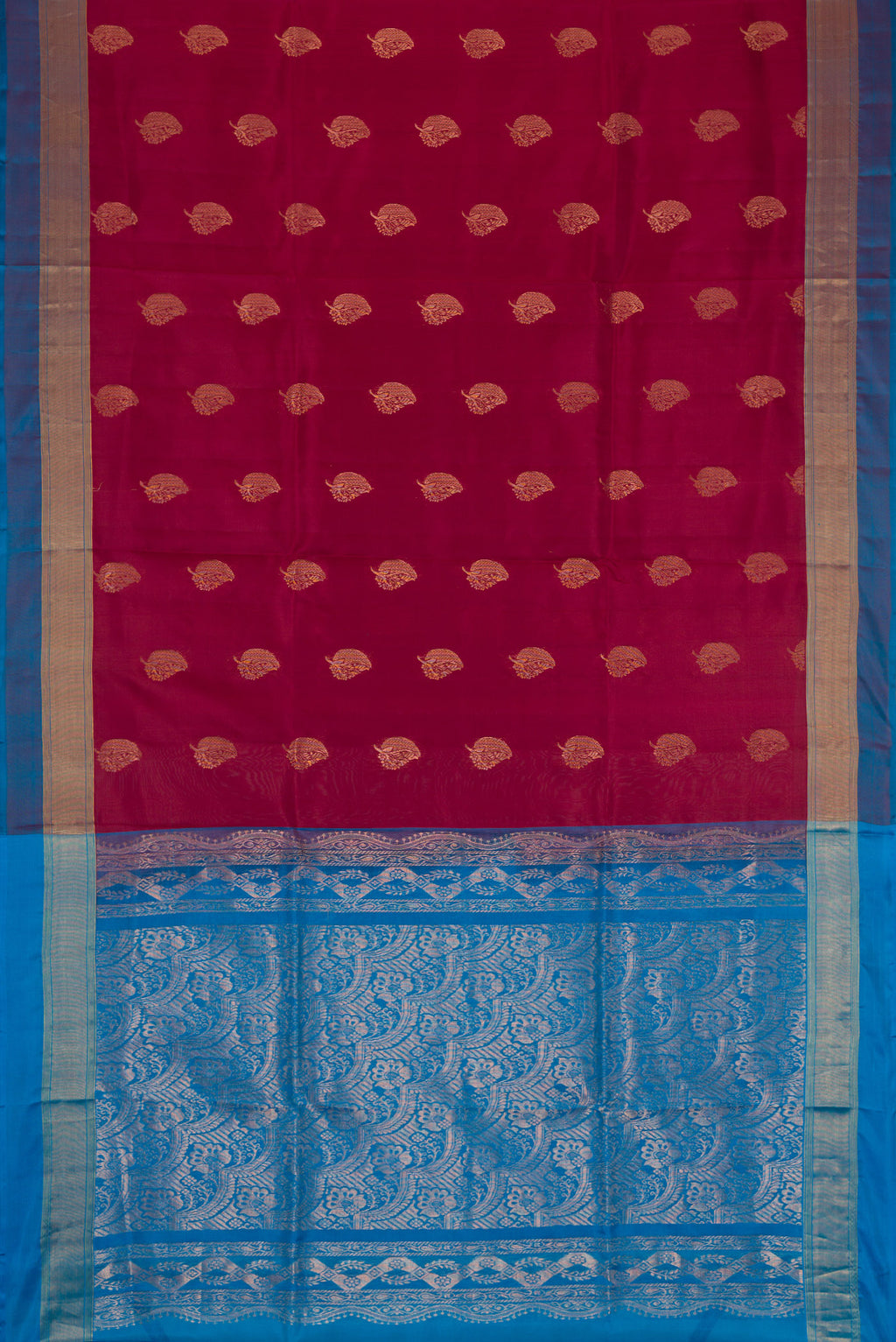 Maroon Dual Tone Soft Silk Saree with Zari Butta on the body and Zari Border.  displayed on a mannequin