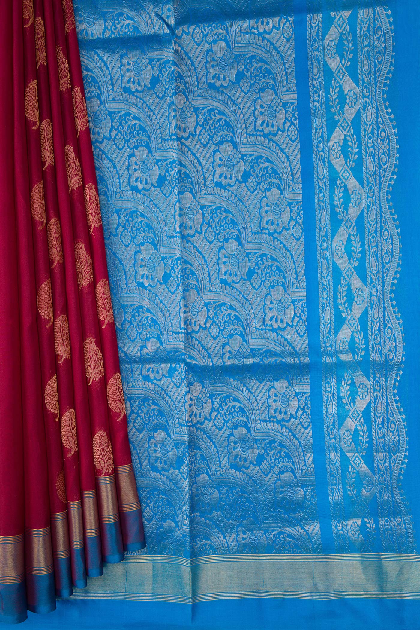 Pleats and pallu of Maroon Dual Tone Soft Silk Saree with Zari Butta on the body and Zari Border. 