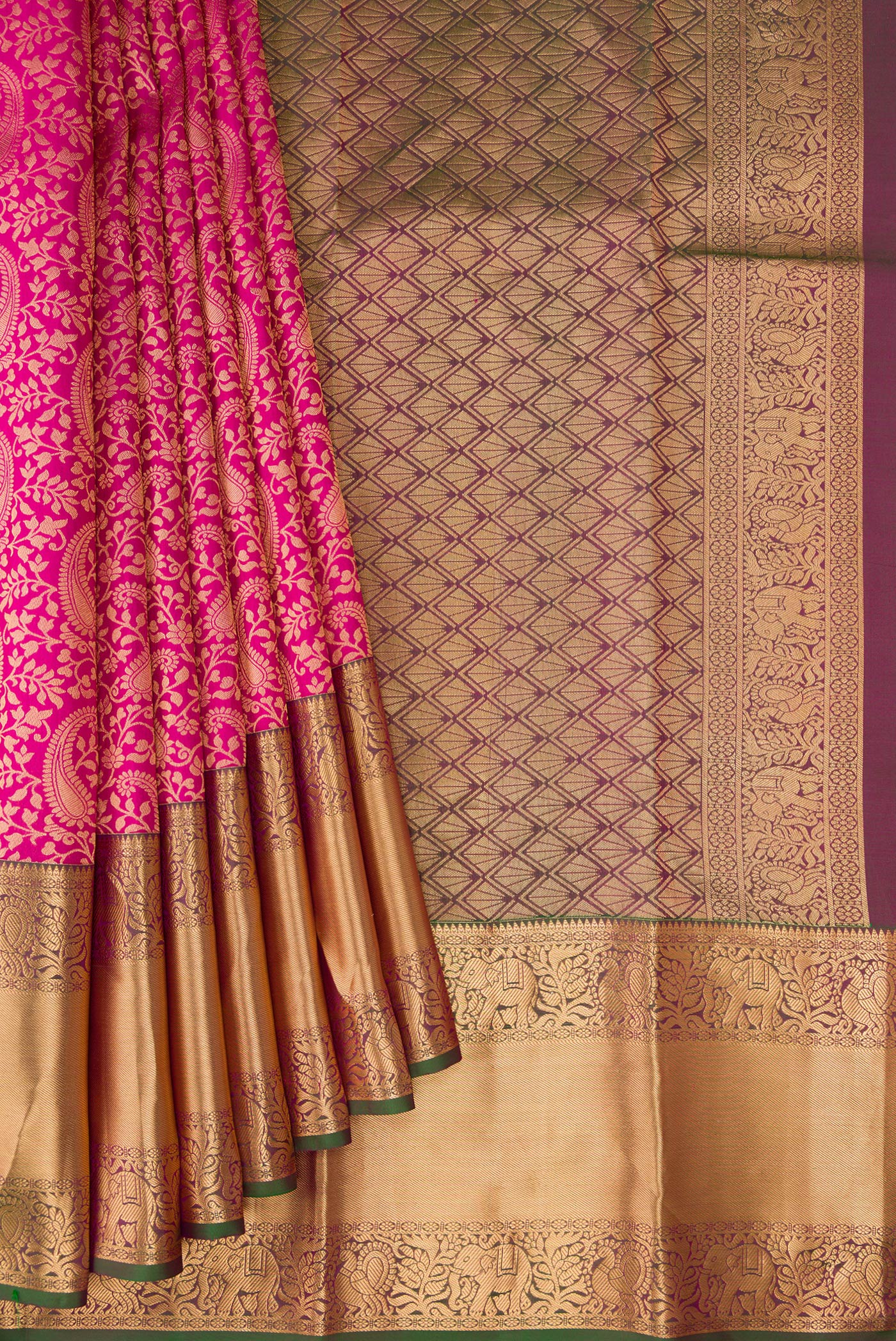 Pleats and pallu of Dark Pink Kanchipuram Silk Saree with Zari Brocade on the body and Zari Border. 