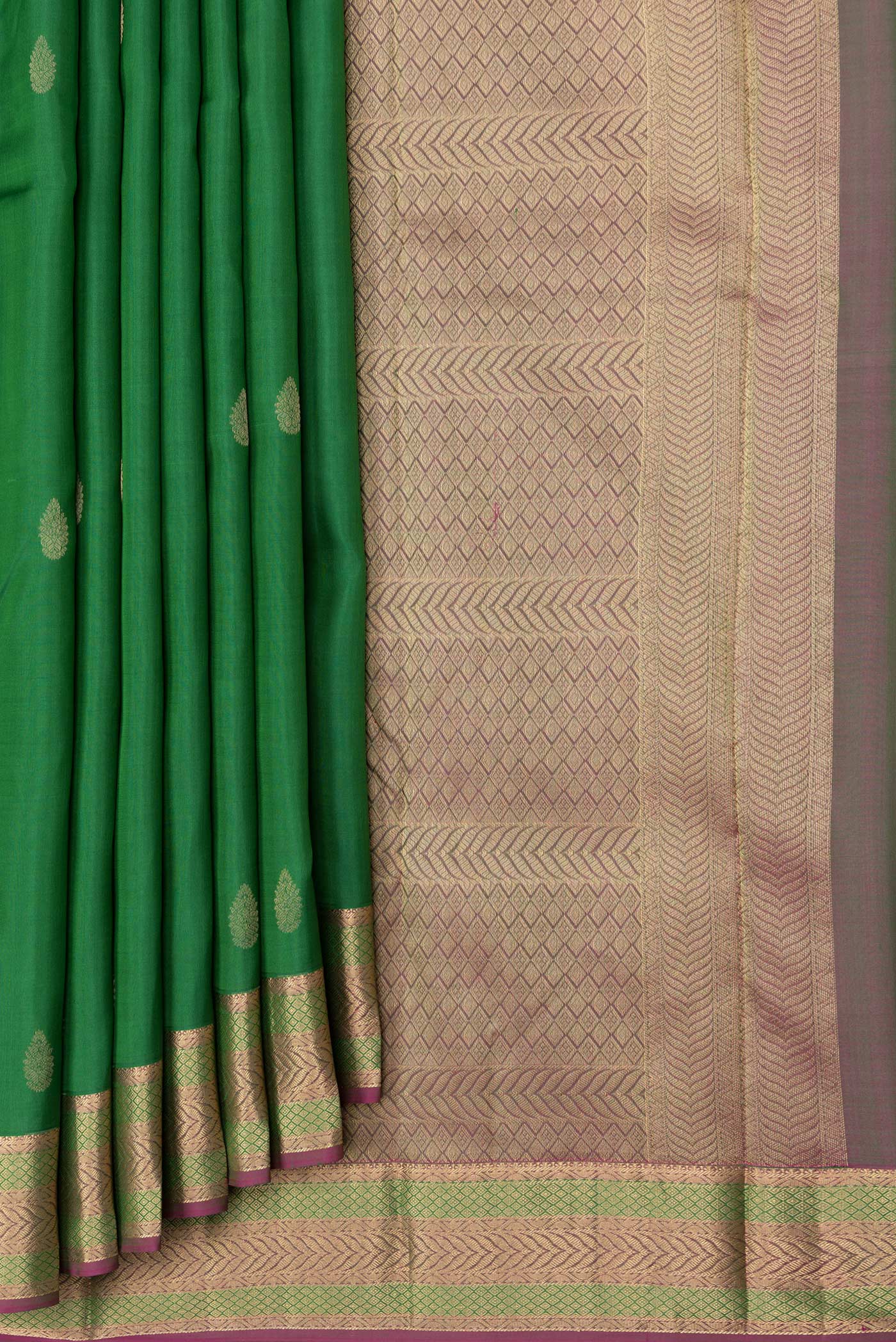 Pleats and pallu of Green Dual Tone Kanchipuram Silk Saree with Zari Butta on the body and Zari Border. 