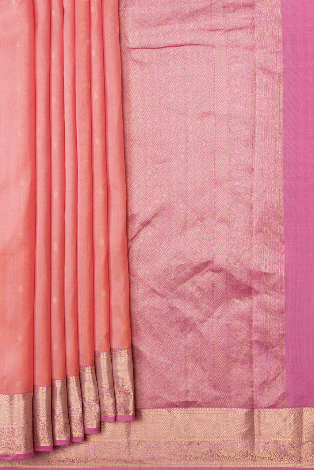 Pleats and pallu of Peach Dual Tone Kanchipuram Silk Saree with Zari Butta on the body and Zari Border. 
