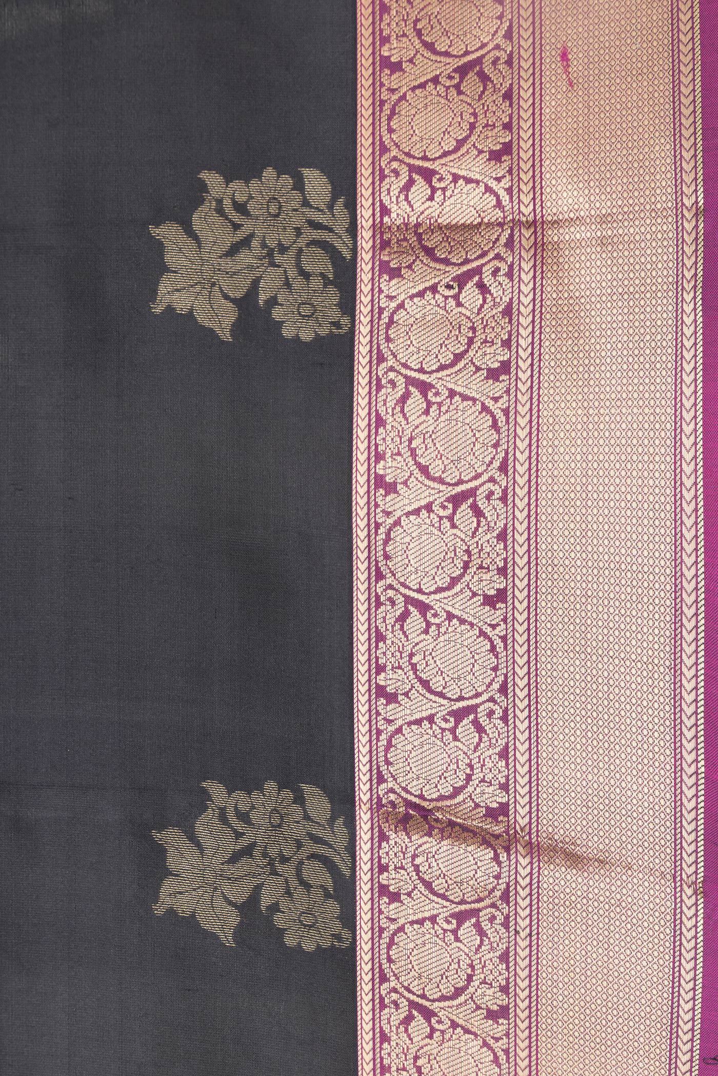 Border image of Black Dual Tone Kanchipuram Silk Saree with Zari Butta on the body and Zari Border. 